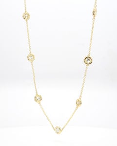 Collier en or jaune orné d'un diamant rond naturel de 2.67 carats TW
