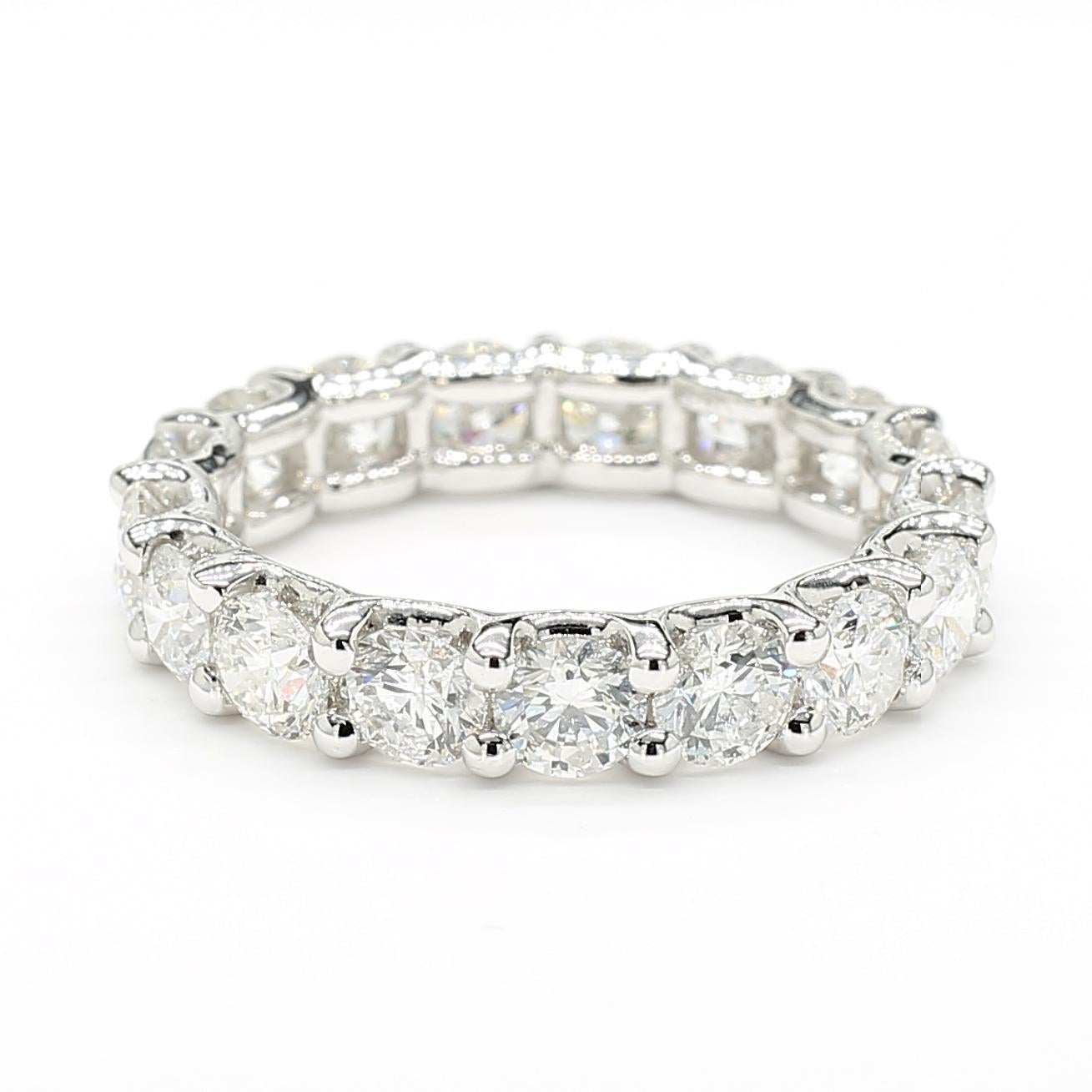 RareGemWorld's beautiful diamond band. Mounted in a beautiful 14K White Gold setting with natural round white diamonds. This band is guaranteed to impress and enhance your personal collection!

Total Weight: 3.60cts

Natural Round White