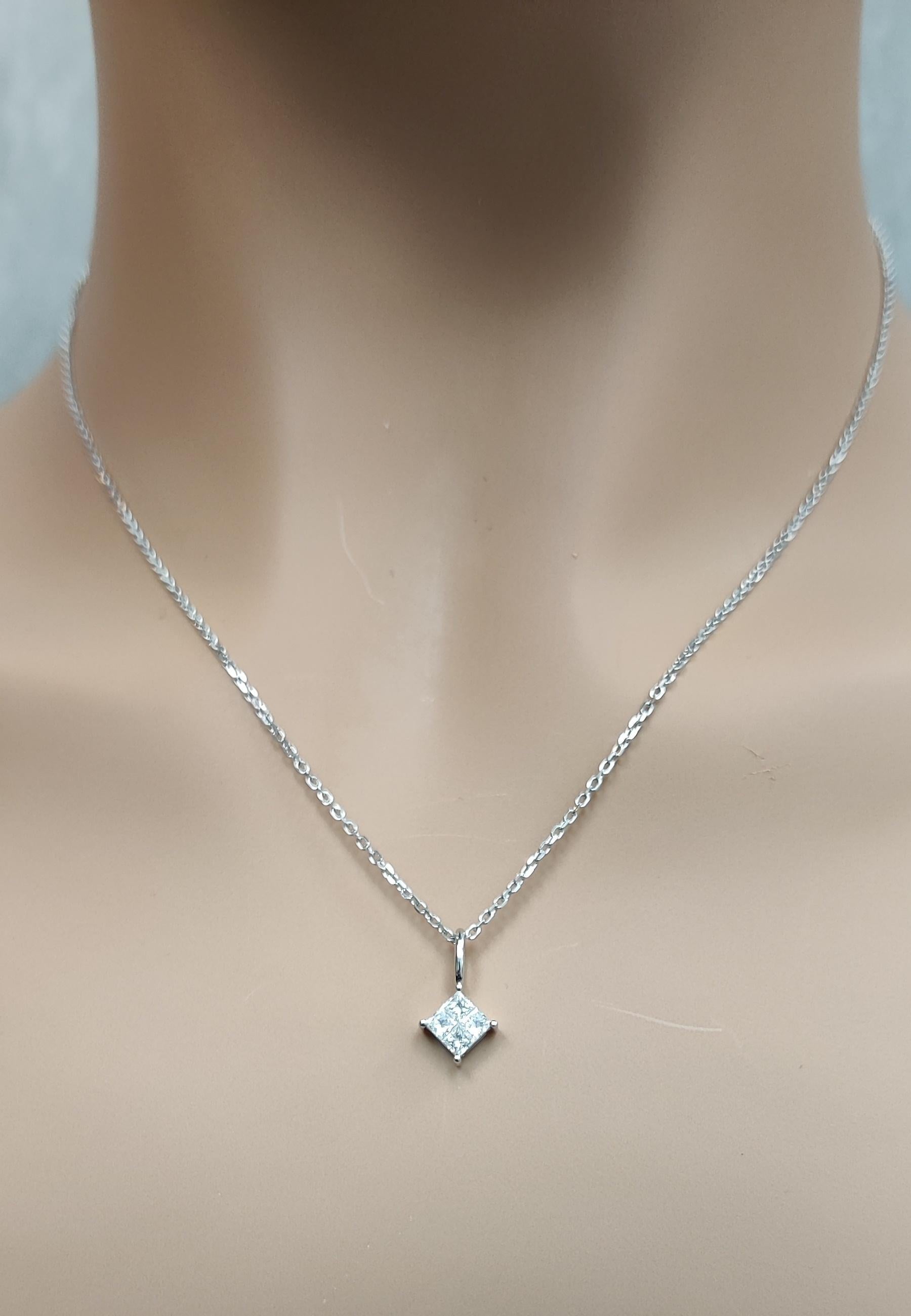 RareGemWorld's classic diamond pendant. Mounted in a beautiful 18K White Gold setting with natural round white diamond melee. This pendant is guaranteed to impress and enhance your personal collection.

Total Weight: .37cts

Natural Round White