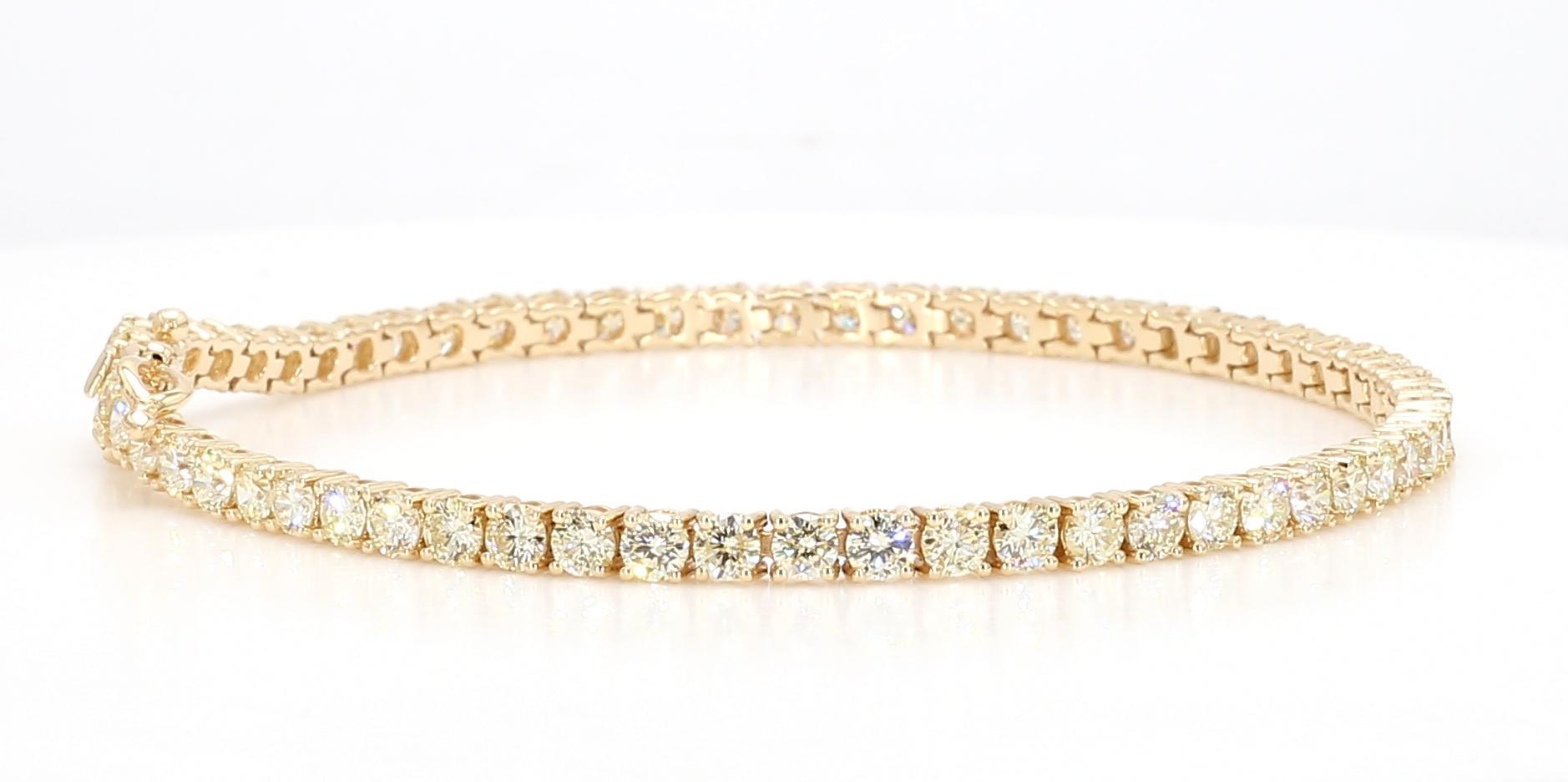 RareGemWorld's classic diamond bracelet. Mounted in a beautiful 18K Yellow Gold setting with round natural white diamond melee. This bracelet is guaranteed to impress and enhance your personal collection.

Total Weight: 5.06cts

Natural Round White