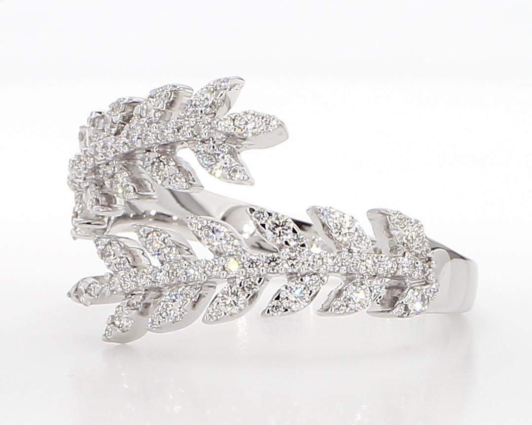RareGemWorld's classic diamond band. Mounted in a beautiful 18K White Gold setting with natural round white diamond melee. This band is guaranteed to impress and enhance your personal collection!

Total Weight: .61cts

Diamond Measurements: