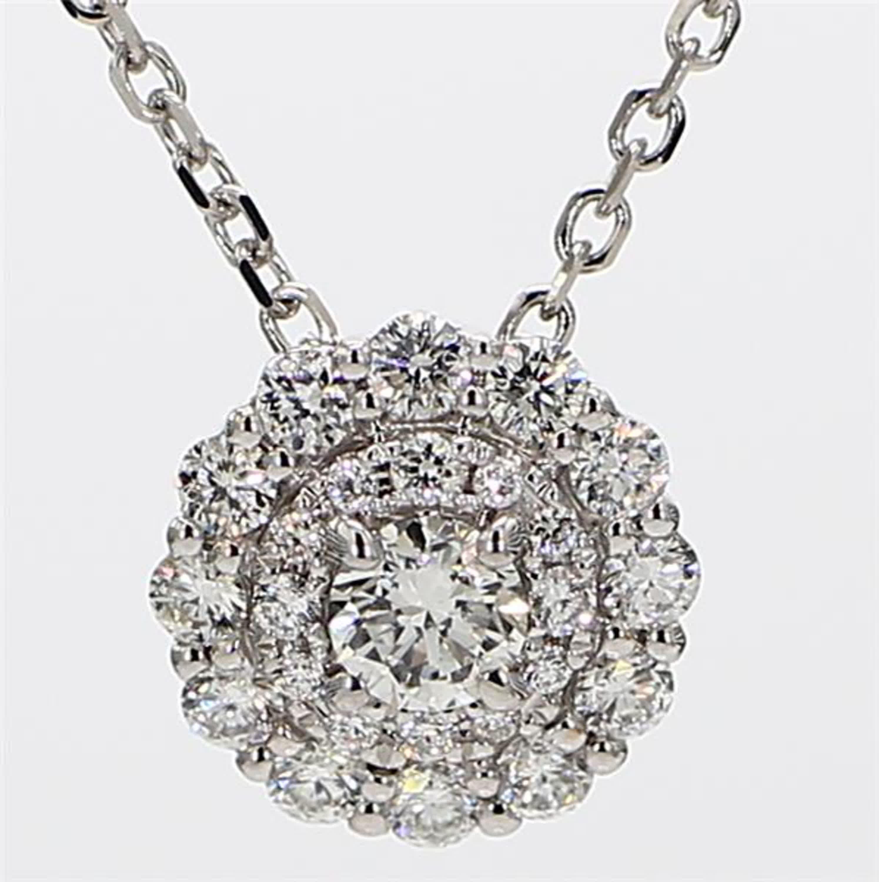 RareGemWorld's classic diamond pendant. Mounted in a beautiful 18K White Gold setting with natural round white diamonds. This pendant is guaranteed to impress and enhance your personal collection.

Total Weight: .72cts

Length x Width: 10.6 x 10.6