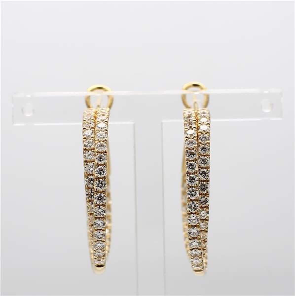 RareGemWorld's classic diamond earrings. Mounted in a beautiful 18K Yellow Gold setting with natural round cut white diamonds. These earrings are guaranteed to impress and enhance your personal collection!

Total Weight: 2.62cts

Width: 32.6
