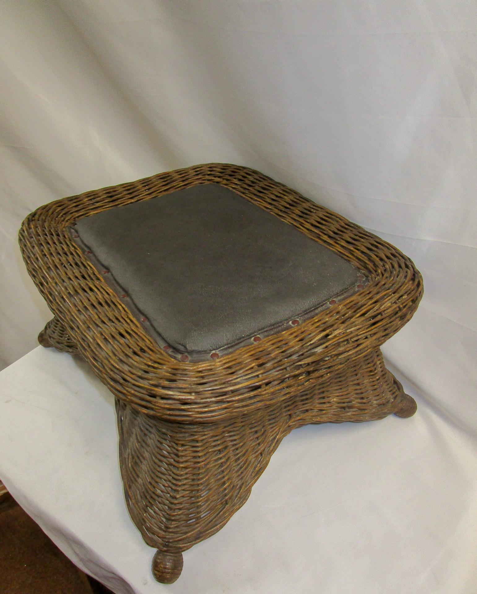 Early 20th Century Natural Wicker Antique Footstool Heywood Brothers & Wakefield Co. w/Leather Seat For Sale