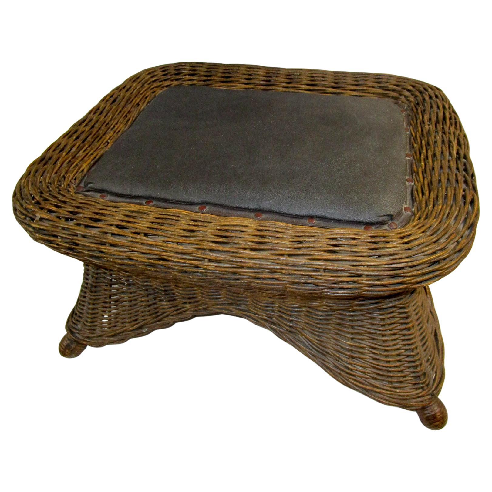 Natural Wicker Antique Footstool Heywood Brothers & Wakefield Co. w/Leather Seat For Sale