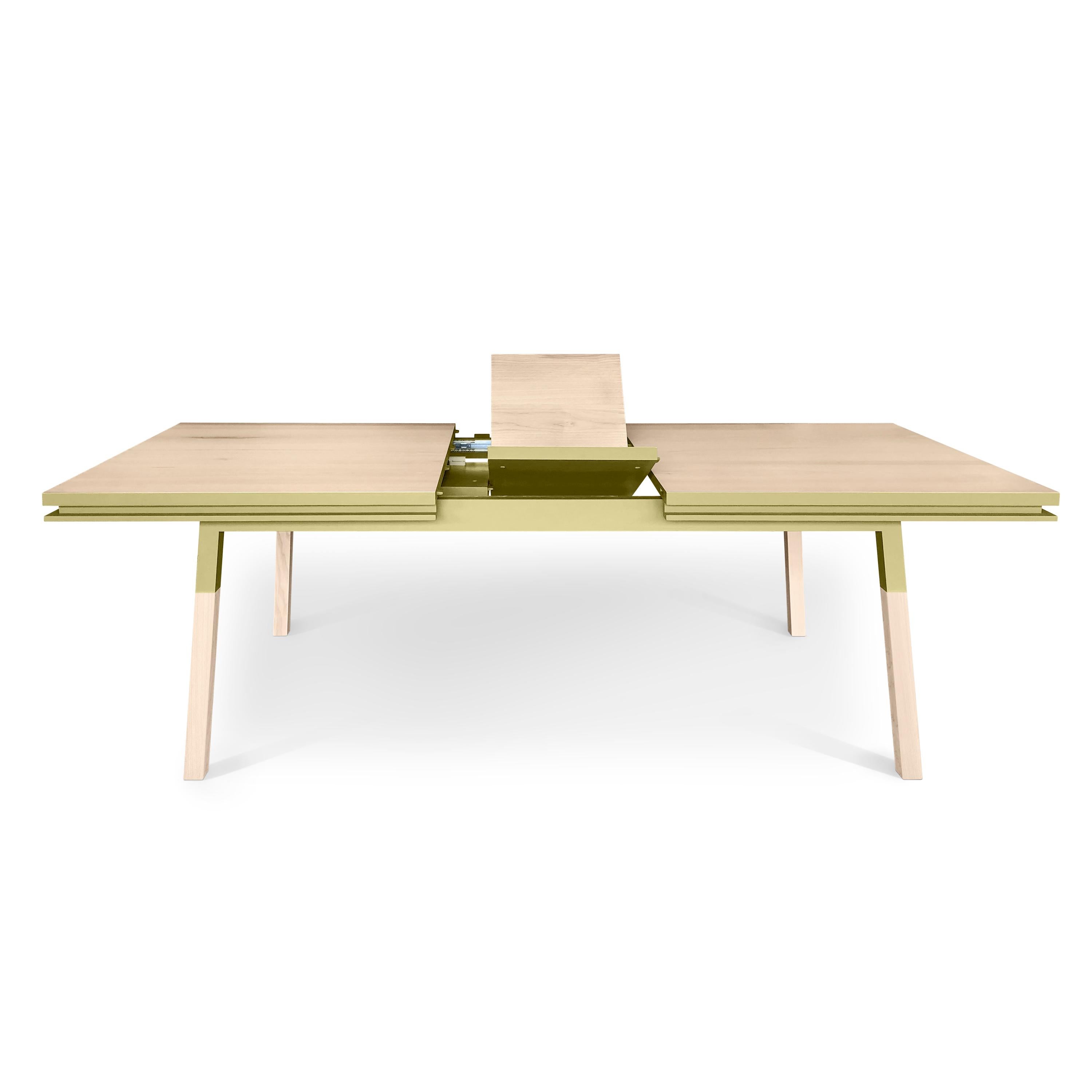 This rectangular dining table is proposed with 2 integrated and folded extensions. 

It is made of 100% solid ash wood from sustainably managed and PEFC certified French forests.

The 3 lengths are 220 cm / 86.6 in when the table is closed, 260 cm /