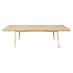 Yellow short pants finish for this extensible dining table in solid wood