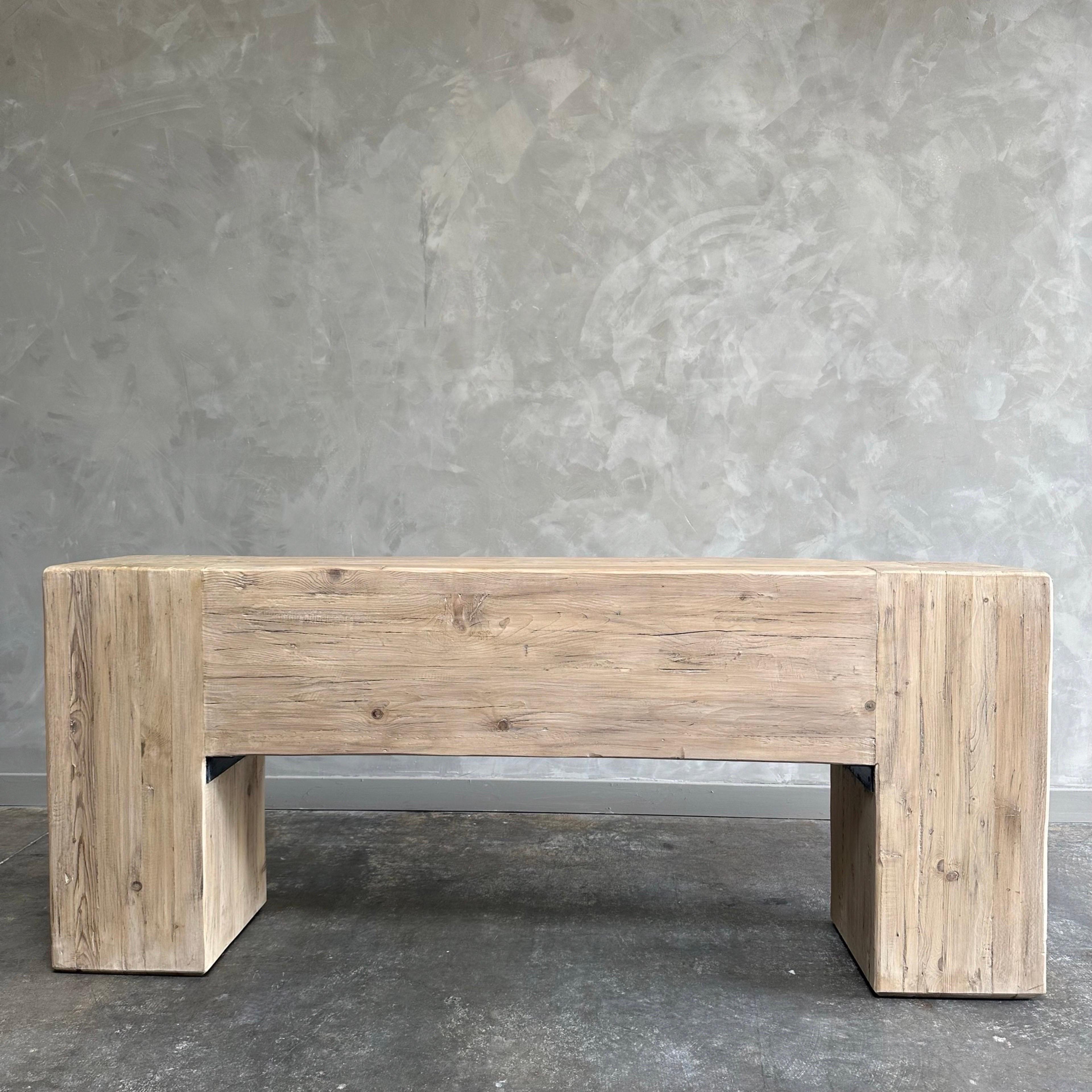 Custom made beam style console table by bloom home inc. 
These old elm and reclaimed pine timbers show in its most primal, natural form. The artisanal construction methods highlight the elm woods beautiful grain pattern & knots and fissures from its