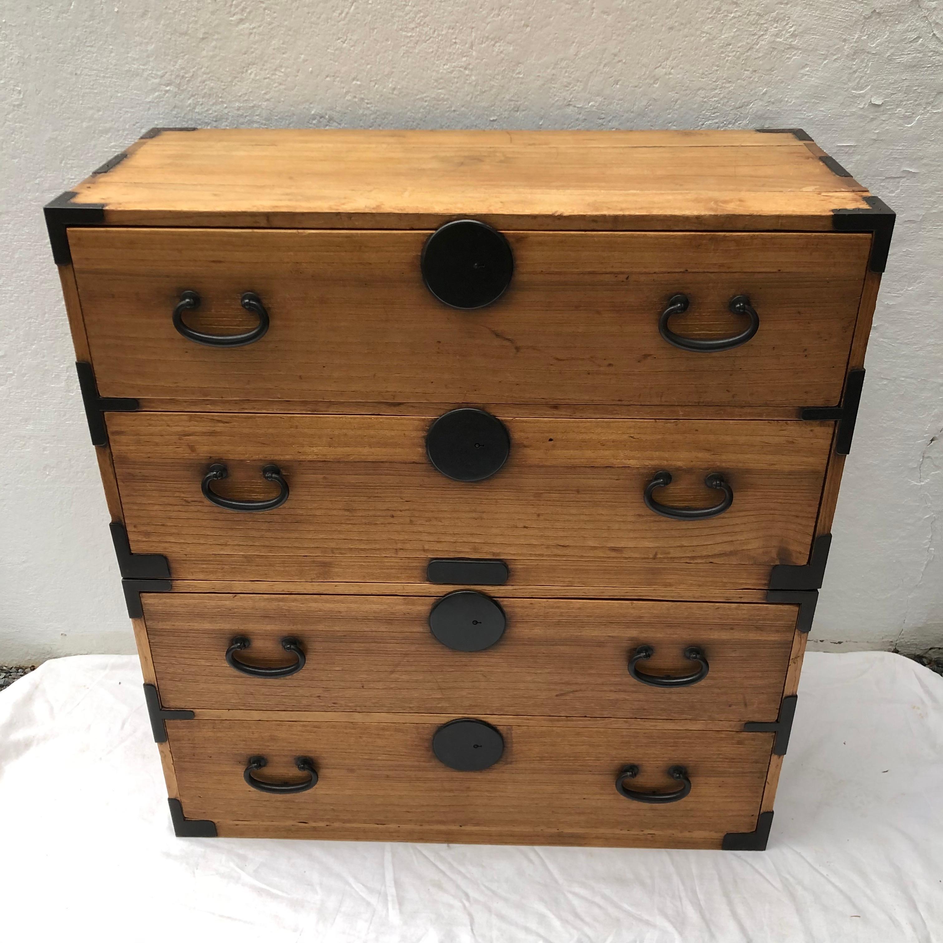Elegant natural wood tansu chest in two pieces.