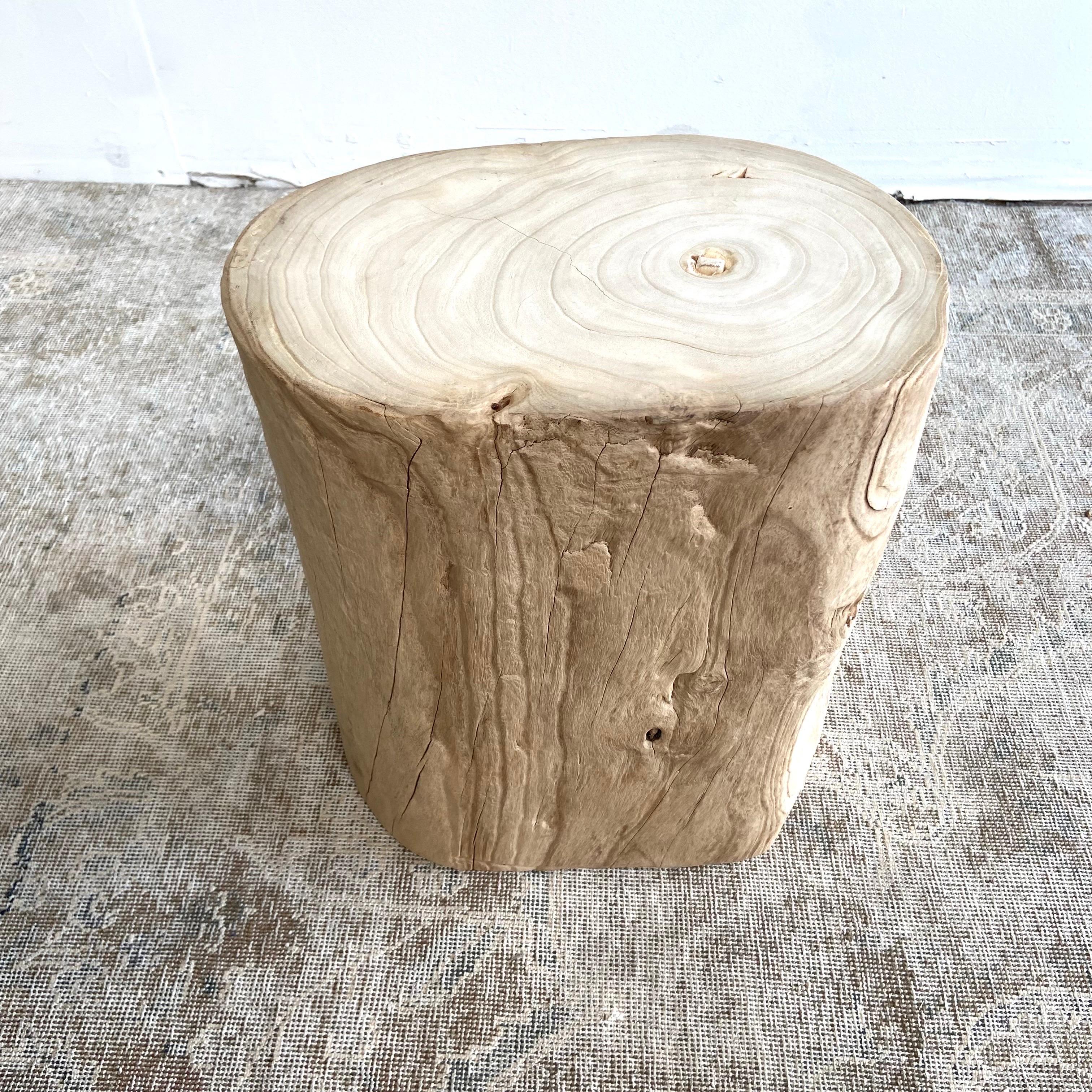 Natural wood side table stump. Beautiful solid stump, great for use as a side table, drink table, or bath. A great architectural accent for any room. This stump has very unique characteristics, grooves, and movement. Solid sturdy, ready for daily