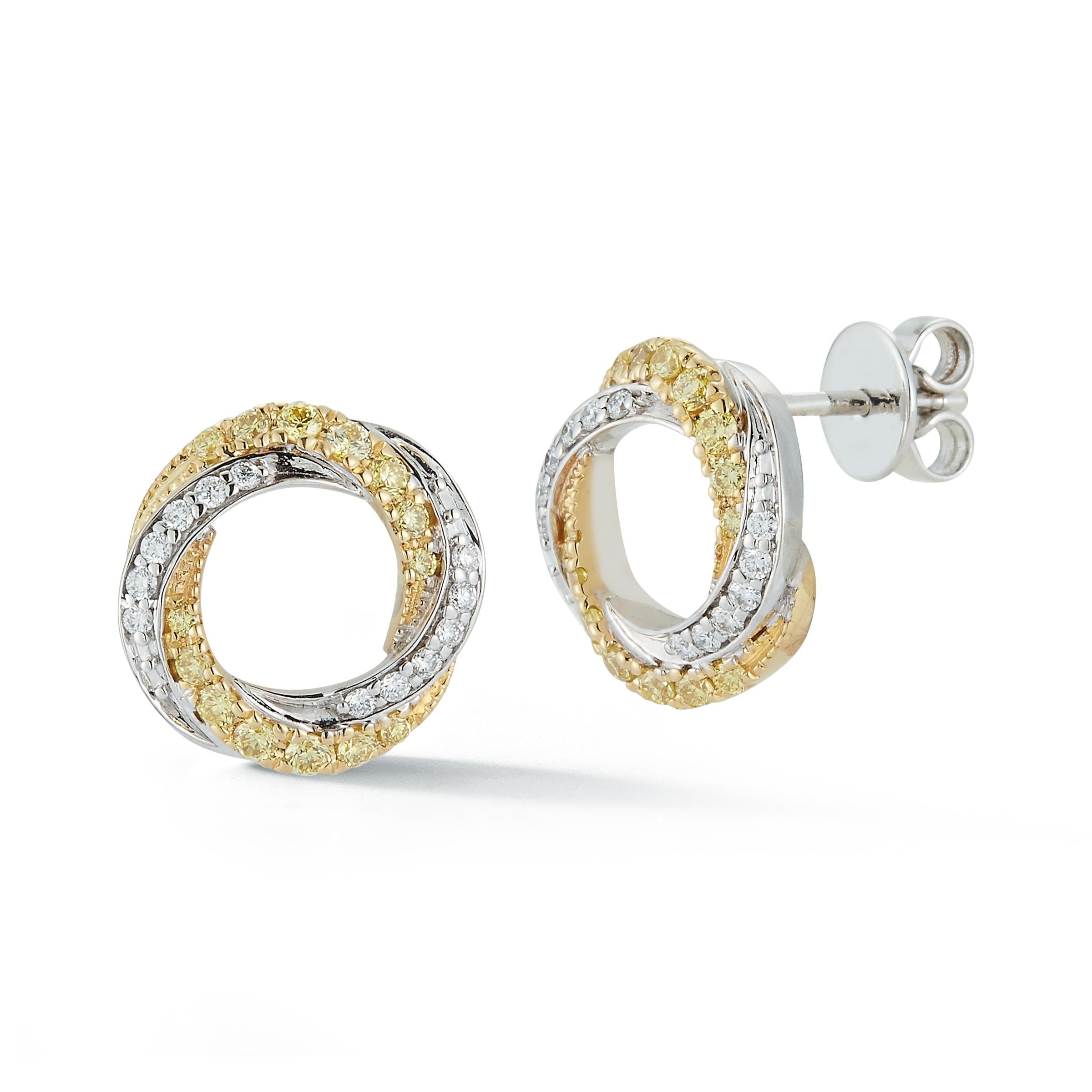 RareGemWorld's classic diamond earrings. Mounted in a beautiful 18K Yellow and White Gold setting with natural round cut yellow diamonds. These earrings include both natural round yellow diamond melee and natural round white diamond melee in a
