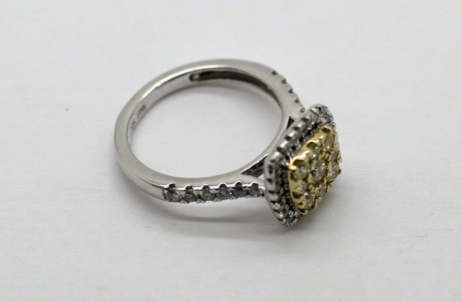 Modern Natural Yellow and White Diamonds Set in a 10k White Gold Ring For Sale