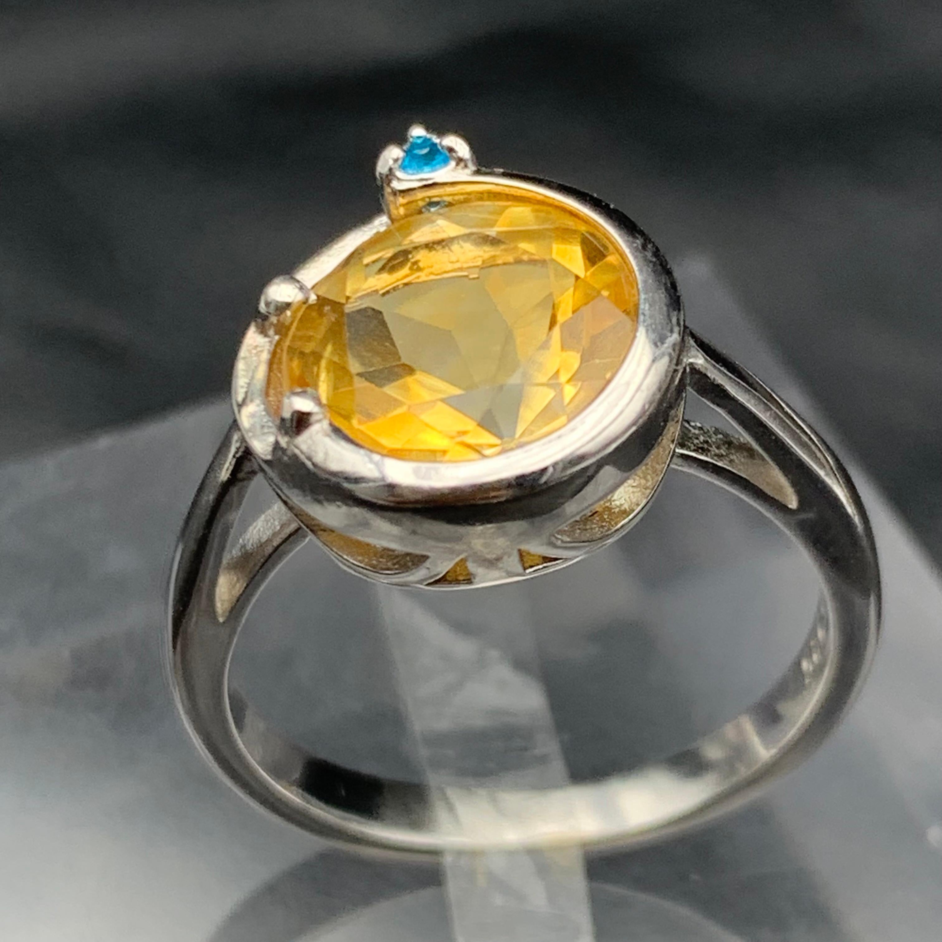 Exquisite Natural Yellow Citrine Ring 925 Sterling Silver with Swiss Blue Topaz Side Stone in a Round Shape!!

💎 GEMSTONE TYPE: Citrine, Swiss Topaz
⚖️  RING WEIGHT: 4.08 Grams
💍  RING SIZE: 8 US
🌈 COLOR: Yellow, Blue
🧪 TREATMENT: None (100%