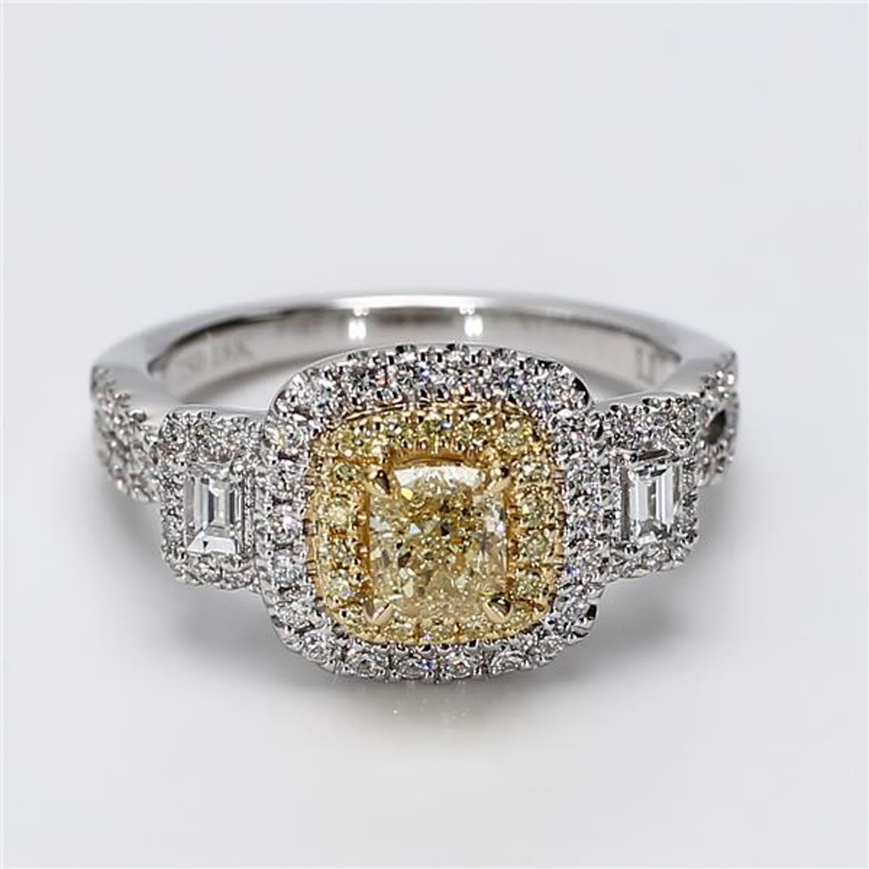 RareGemWorld's classic diamond ring. Mounted in a beautiful 18K Yellow and White Gold setting with a natural cushion cut yellow diamond. The yellow diamond is surrounded by natural baguette cut white diamonds, round natural white diamond melee, and