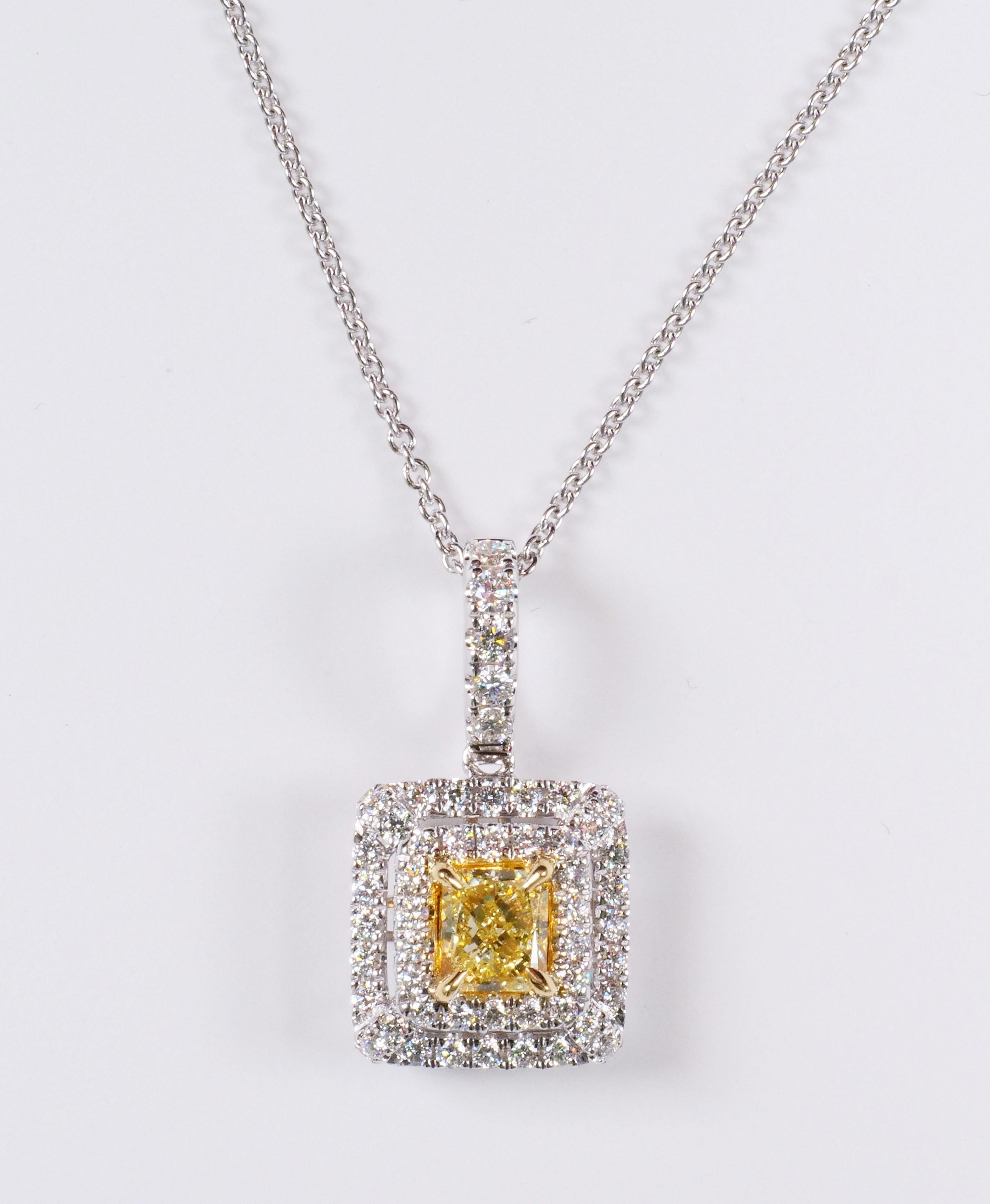 Rare cushion natural yellow and white diamond pendant. This pendant is designed to be placed in a simple setting. Can be used as a drop pendant or in addition to your collection of jewels.

Total Weight: 1.11cts

Centerstone Measurements: