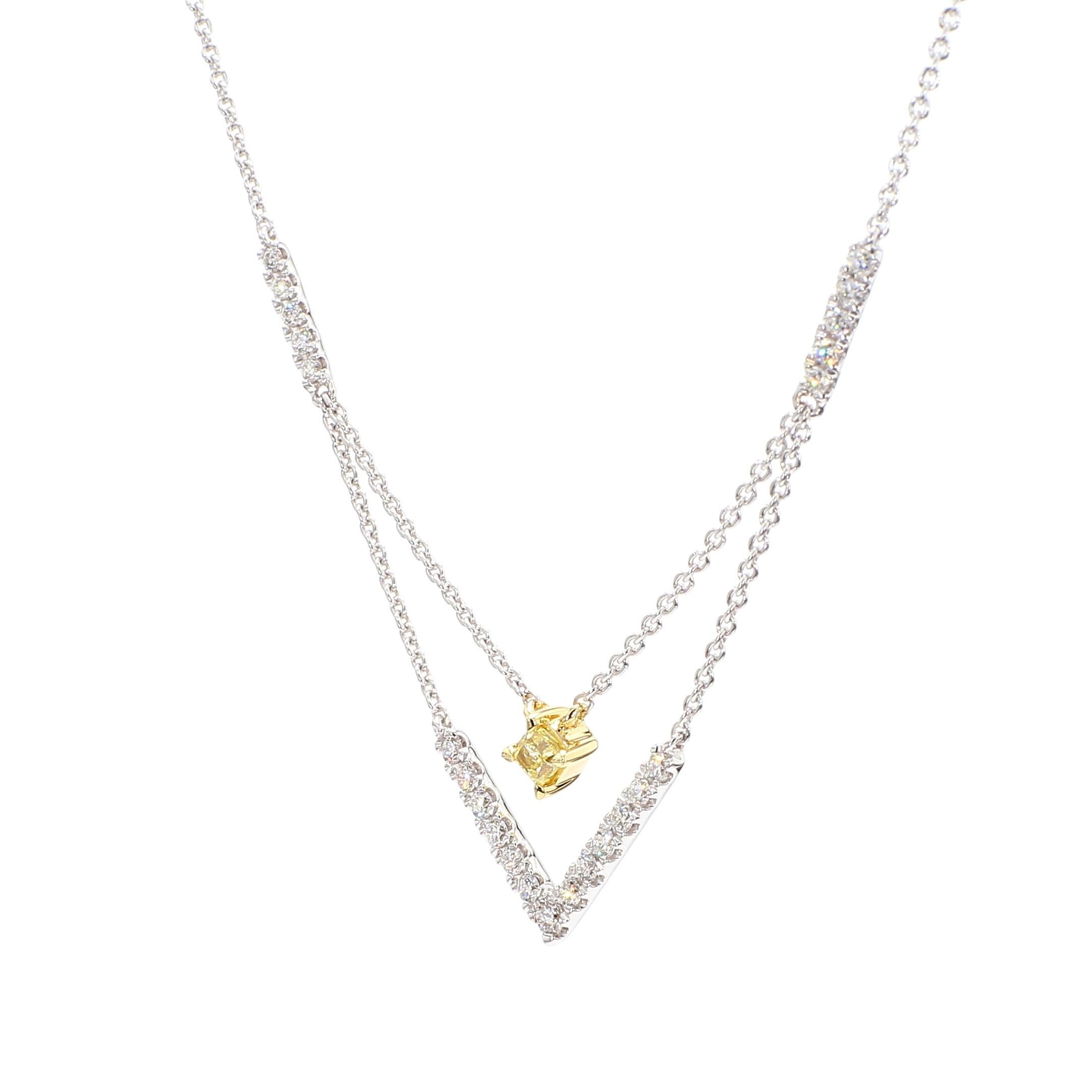 RareGemWorld's beautiful diamond necklace. Mounted in a beautiful 18K Yellow and White Gold setting with a natural cushion cut yellow diamond. The yellow diamond is surrounded by small round natural white diamond melee. This pendant is guaranteed to