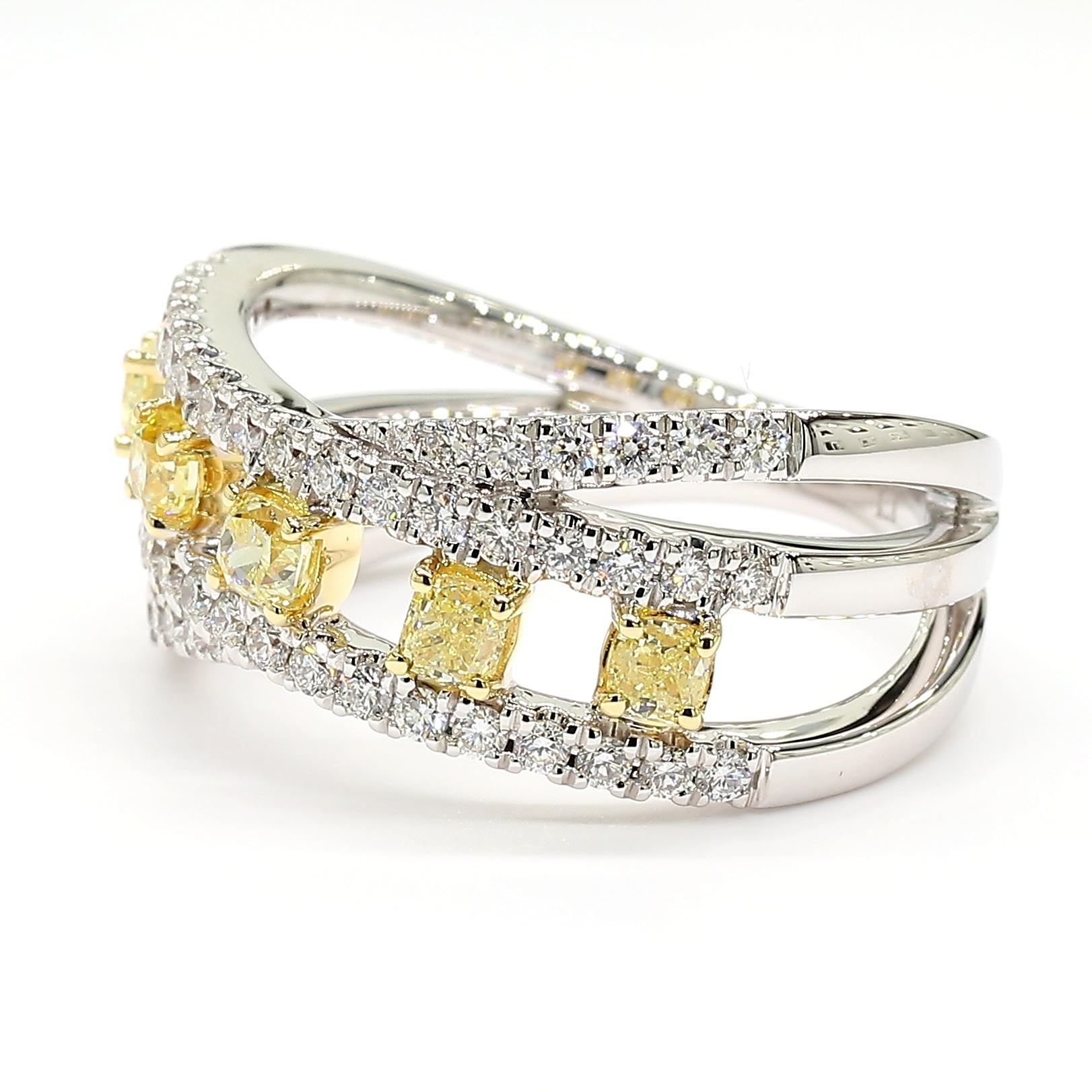 RareGemWorld's beautiful diamond band. Mounted in a beautiful 18K Yellow and White Gold setting with natural cushion cut yellow diamonds complimented by natural round cut white diamonds. This band is guaranteed to impress and enhance your personal
