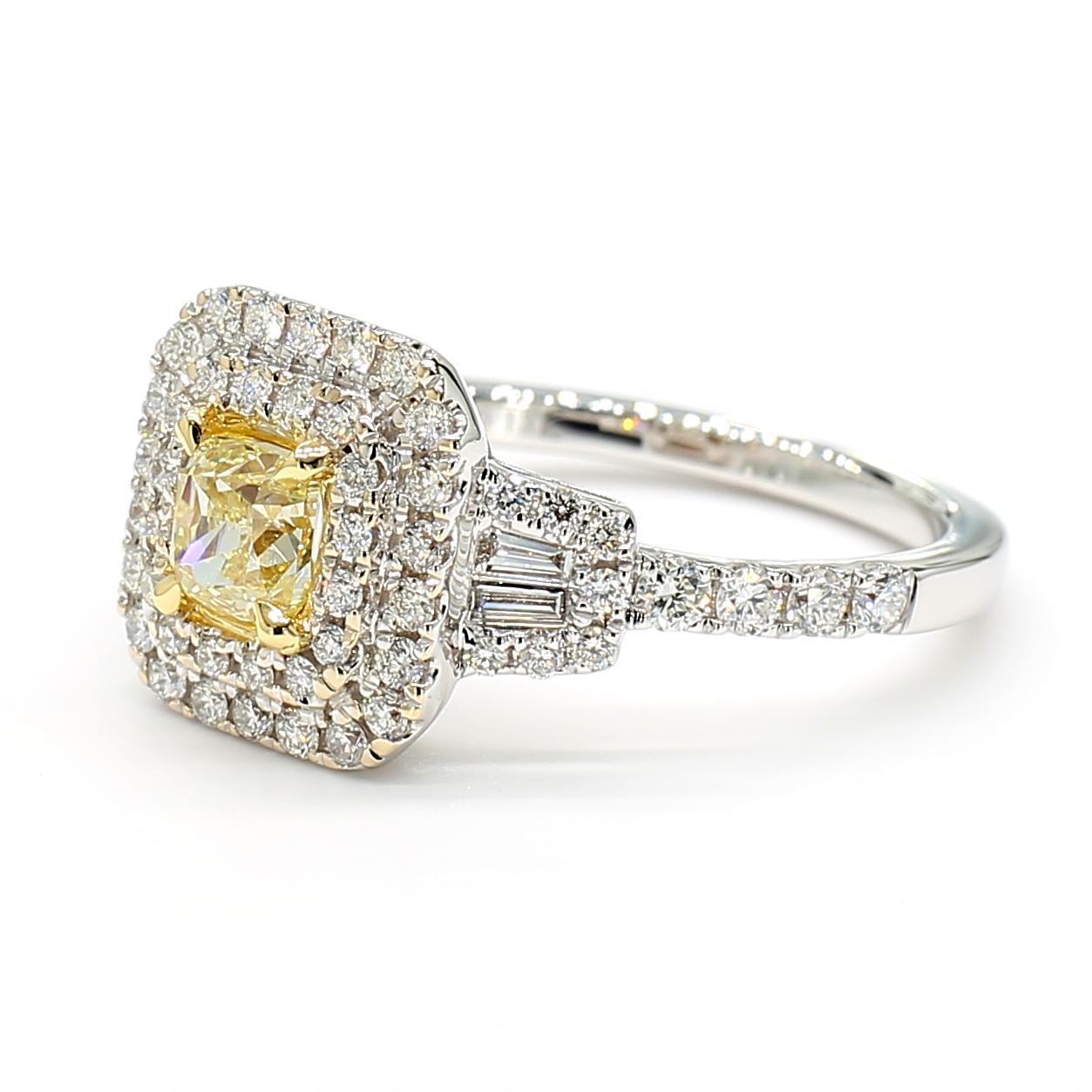RareGemWorld's beautiful diamond ring. Mounted in a beautiful 18K Yellow/White Gold setting with a natural cushion cut yellow diamond. The yellow diamond is surrounded by natural baguette cut white diamonds and round natural white diamond melee.
