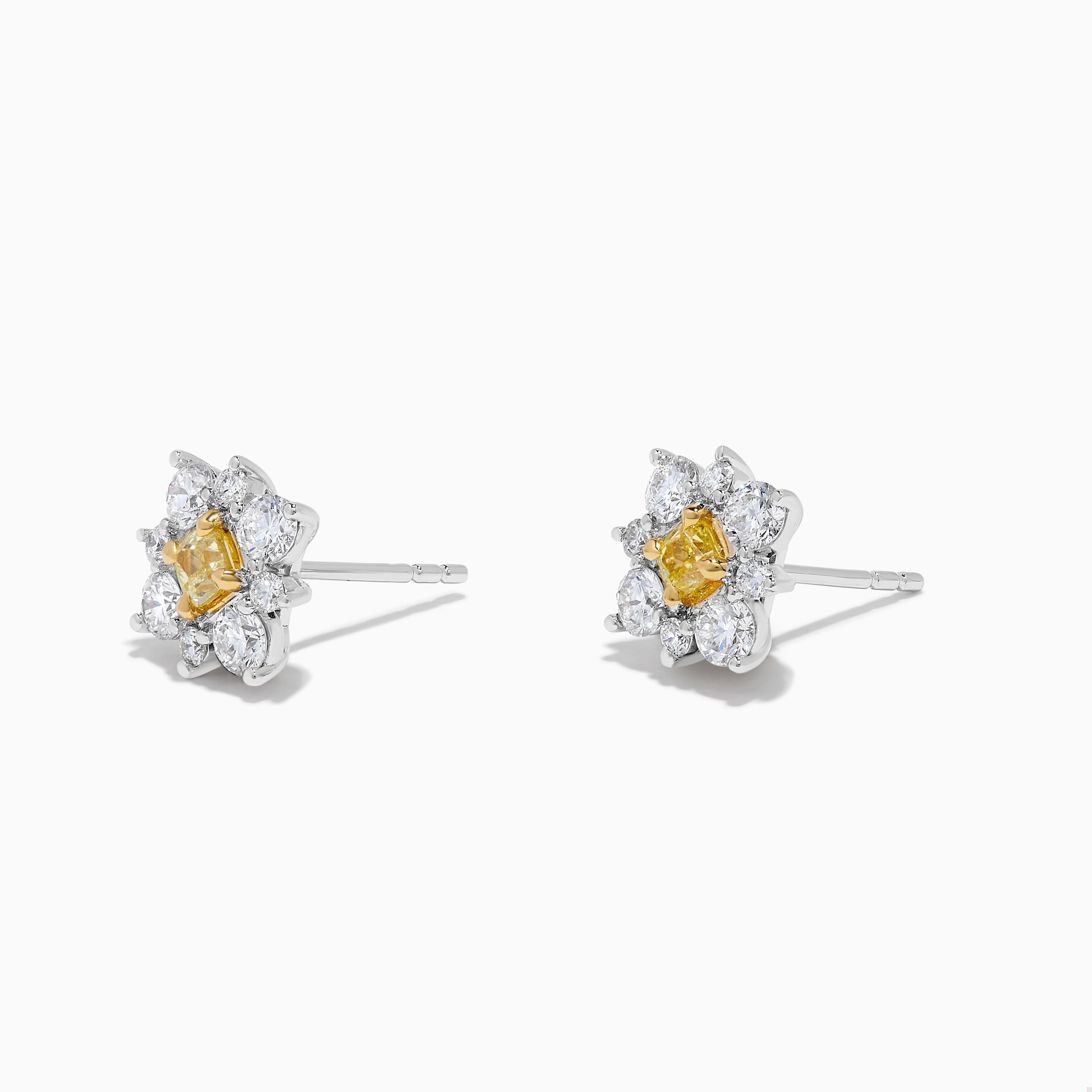 RareGemWorld's classic diamond earrings. Mounted in a beautiful 18K Yellow and White Gold setting with natural cushion cut yellow diamonds. The yellow diamonds are surrounded by small round natural white diamond melee. These earrings are guaranteed