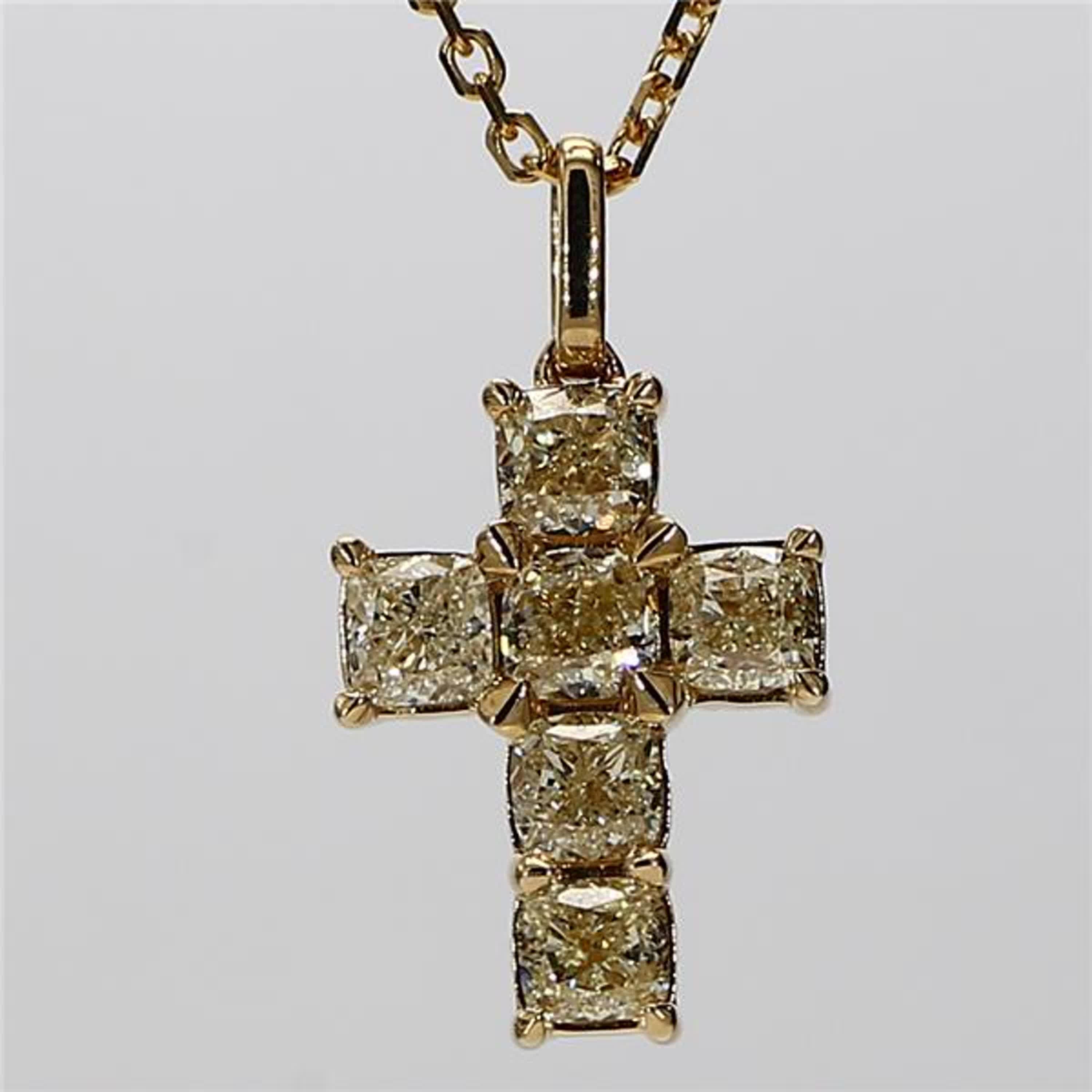 RareGemWorld's classic diamond pendant. Mounted in a beautiful 18K Yellow Gold setting with natural cushion cut yellow diamonds in a beautiful cross format. This pendant is guaranteed to impress and enhance your personal collection!

Total Weight: