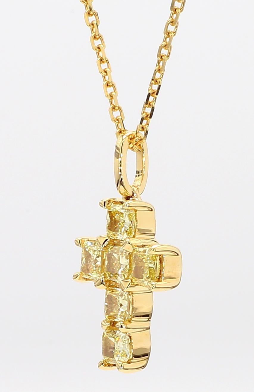 RareGemWorld's beautiful diamond pendant. Mounted in a beautiful 18K Yellow Gold setting with natural cushion cut yellow diamonds in a beautiful cross format. This pendant is guaranteed to impress and enhance your personal collection!

Total Weight: