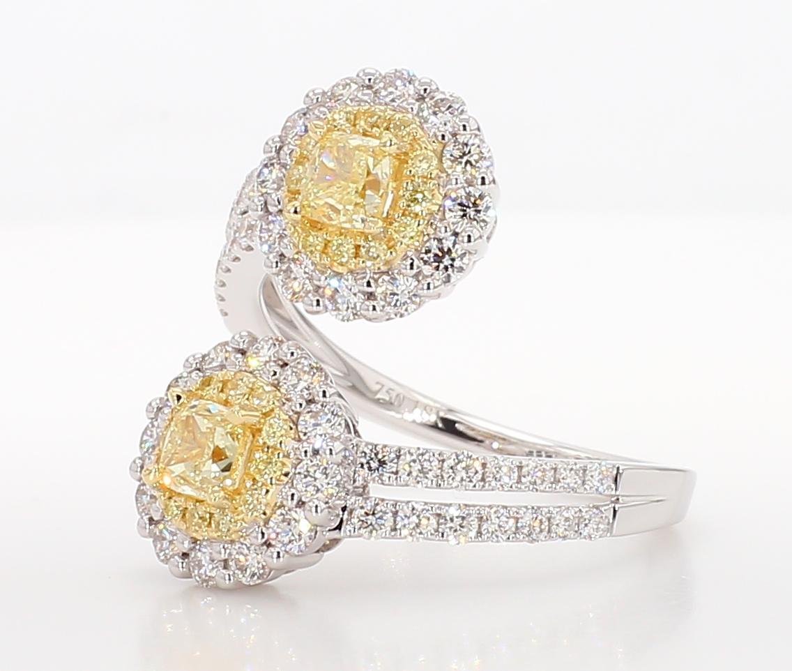 RareGemWorld's beautiful GIA certified diamond ring. Mounted in a beautiful 18K Yellow and White Gold setting with natural cushion cut yellow diamonds. The yellow diamonds are surrounded by round natural yellow diamond melee and round natural white