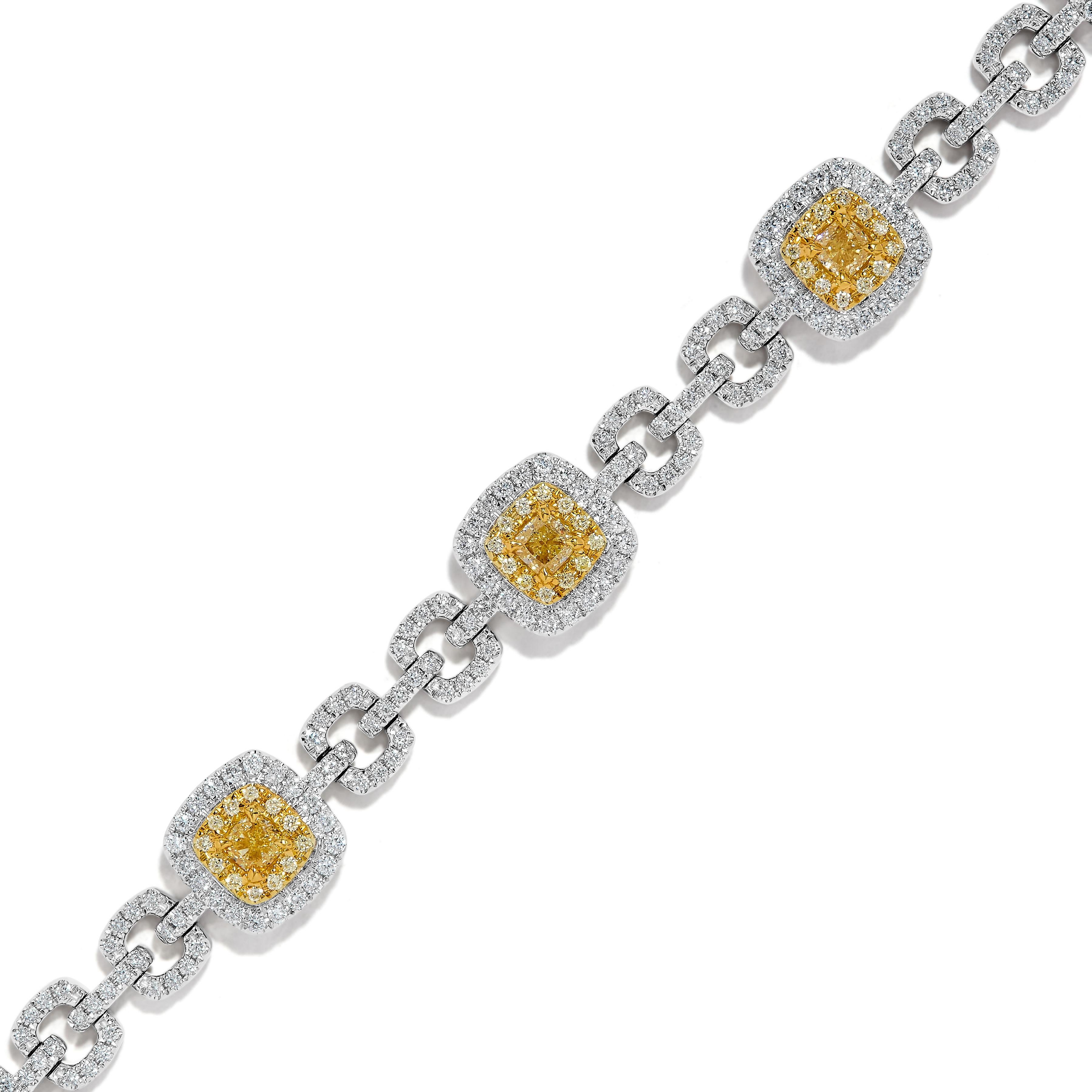 Das klassische Diamantarmband von RareGemWorld. Eingefasst in eine wunderschöne Fassung aus 18 Karat Gelb- und Weißgold mit 7 gelben Diamanten im Kissenschliff. Die gelben Diamanten sind umgeben von runden natürlichen gelben Diamanten und runden