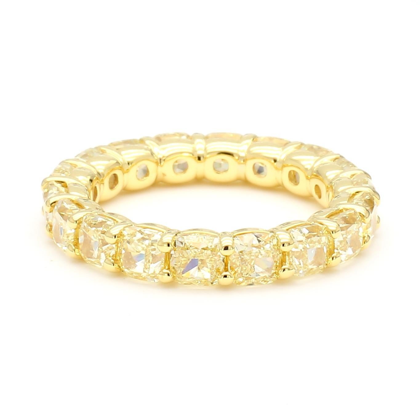RareGemWorld's beautiful diamond eternity band. Mounted in a beautiful 18K Yellow and White Gold setting with natural cushion cut yellow diamonds. This band is guaranteed to impress and enhance your personal collection!

Total Weight: