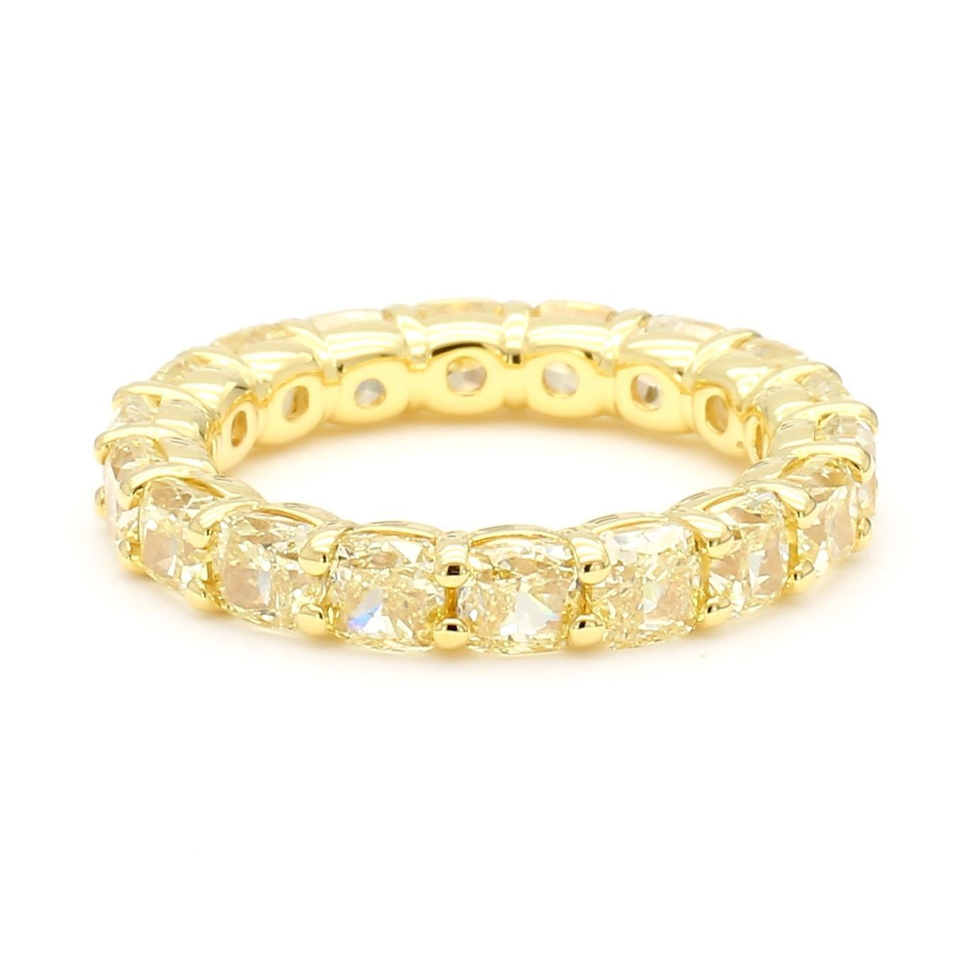 Contemporary Natural Yellow Cushion Diamond 5.61 Carat TW Yellow Gold Eternity Band For Sale
