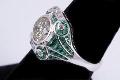 Natural Yellow Diamond and Emerald Ring