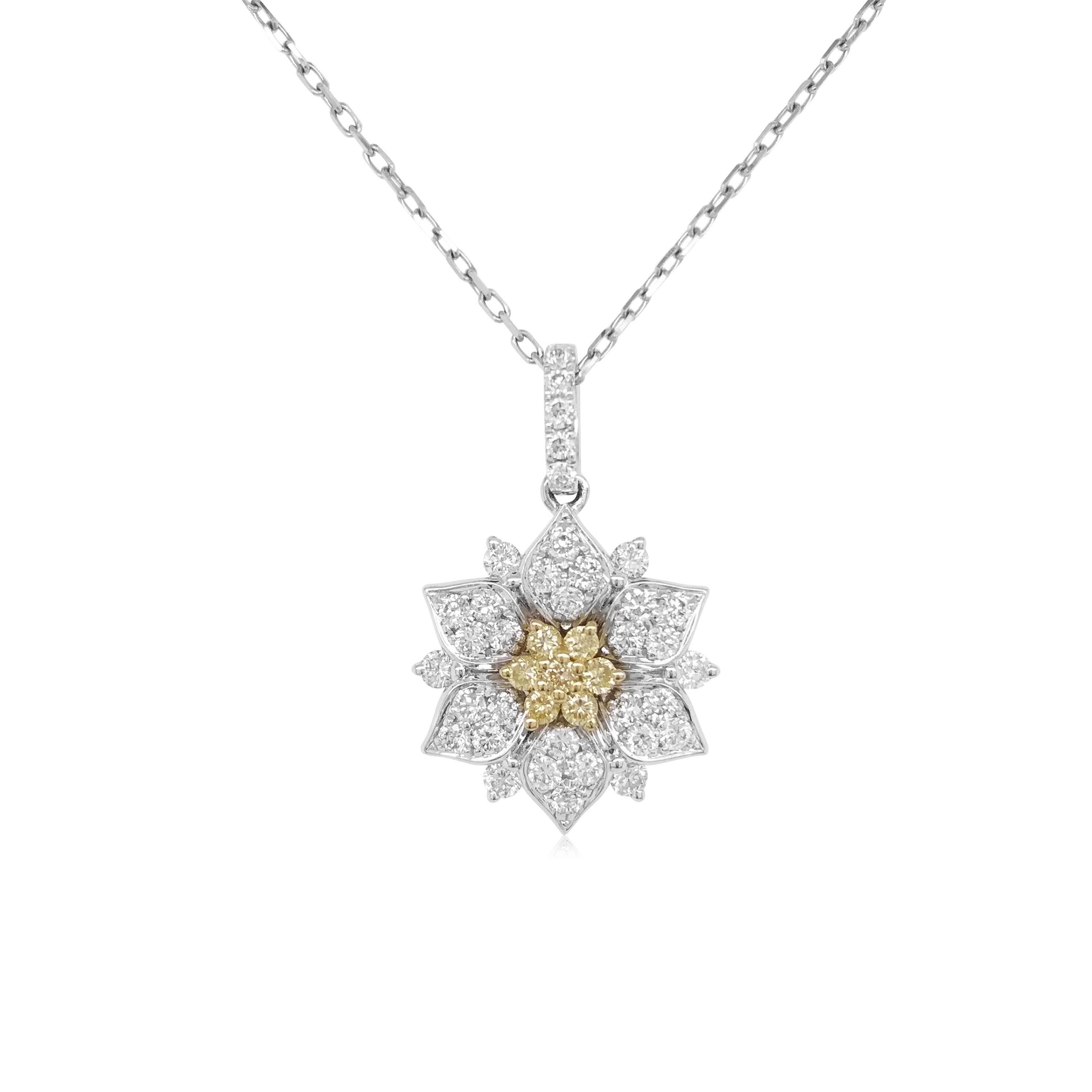 Hermoso y raro Diamante Amarillo Natural tachonado en el centro de un colgante de diamante Blanco de diseño floral, perfecto para una ocasión especial

Diamante Amarillo - 0,09 ct
Diamante blanco - 0,38 ct

HYT Jewelry es una empresa privada con