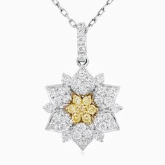 Ciondolo con diamante giallo naturale e diamante bianco dal design floreale