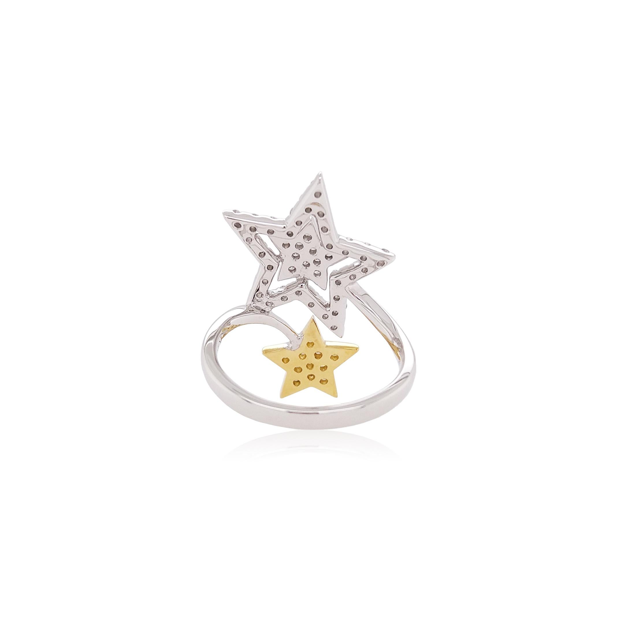 This hypnotic ring features two mesmeric star-shaped Yellow and White diamonds, set amongst a delicate scattering of diamonds. Each diamond is completely unique, and this design perfectly highlights the allure and mystique of diamonds. This