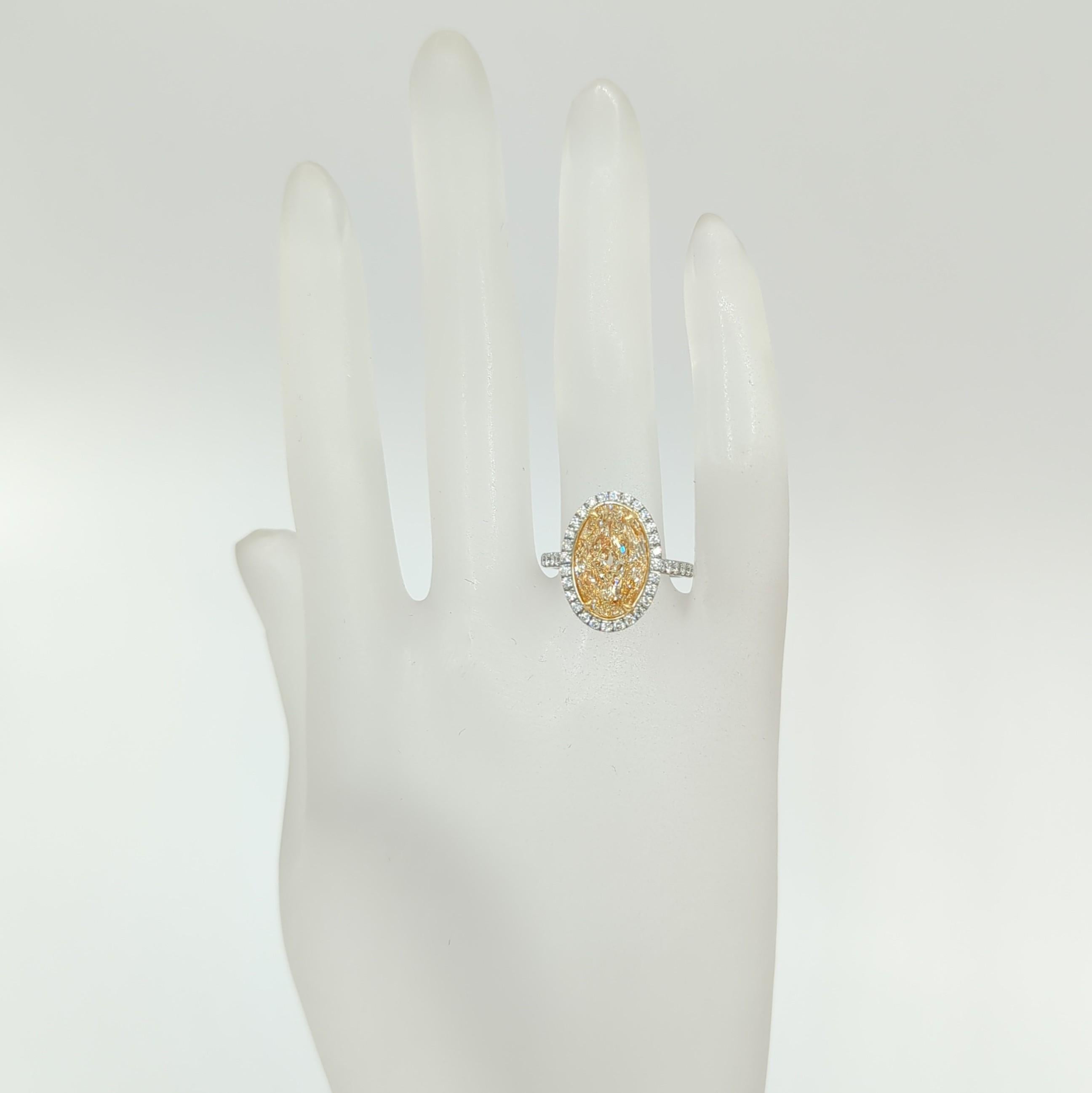 Oval Cut Natural Yellow Diamond Oval and White Diamond Ring in 18K 2 Tone Gold