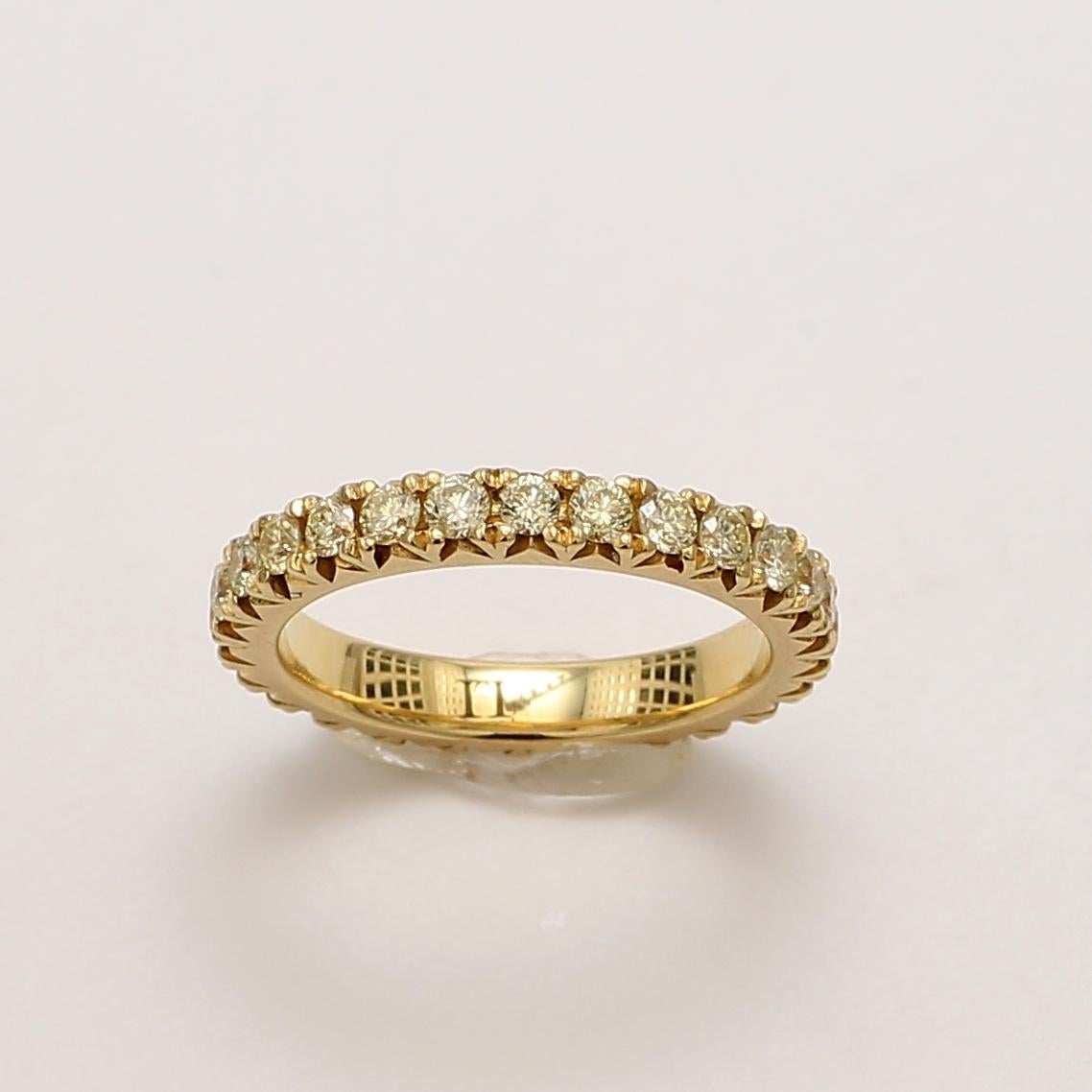 Exquisite and delightful eternity band consisting of 27 round yellow diamonds incased in 18k yellow gold.
27 Yellow Diamonds 1.06cts 
18K Yellow Gold
Size 6 
This ring is not sizable 
Do not forget to view our entire inventory!