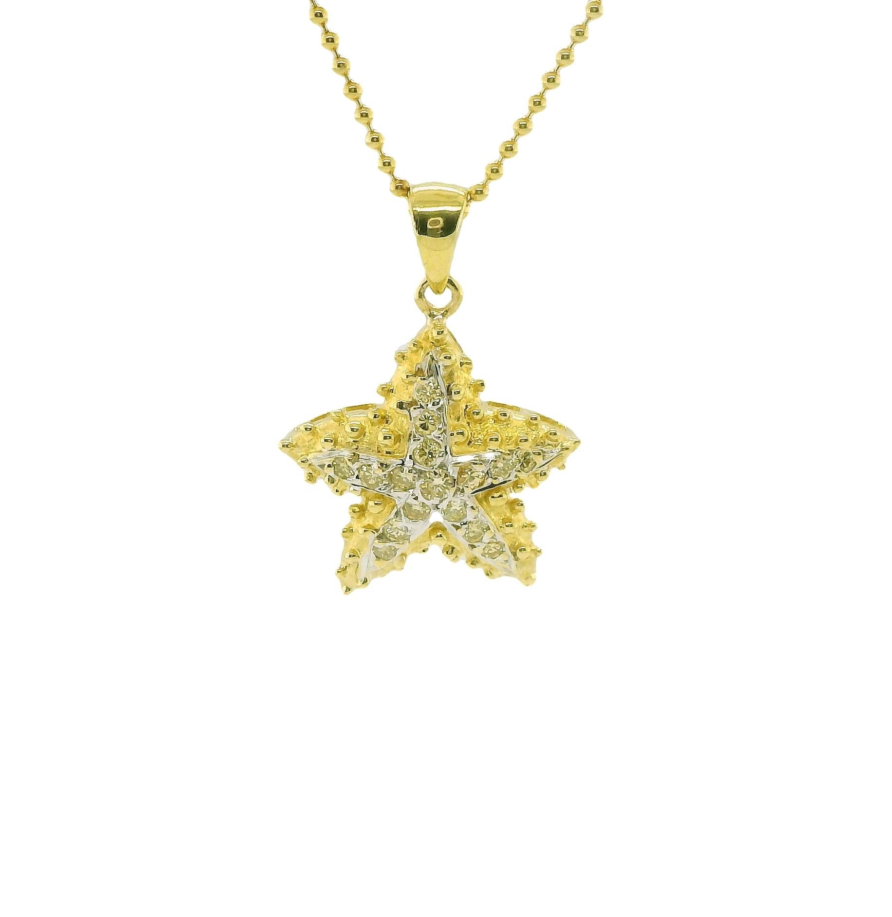 This pretty, 18k yellow gold starfish pendant comes to life as it sparkles with natural fancy yellow diamonds! Delicate gold beading and soft curves give the starfish wonderful dimension. The center is rhodium-finished to create a striking two-toned