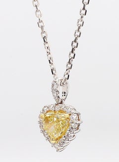 Natural Yellow Heart Diamond 0.90 Carat TW Gold Heart Pendant