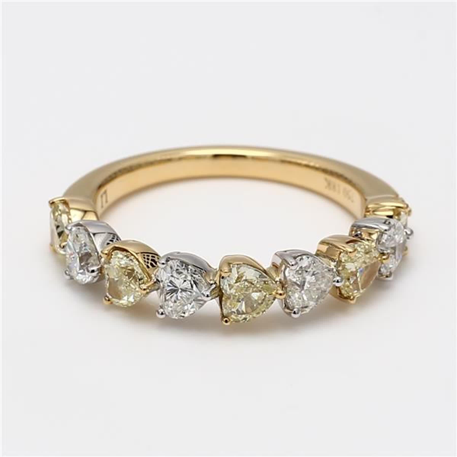 RareGemWorld's classic diamond band. Mounted in a beautiful 18K Yellow and White Gold setting with natural heart cut yellow diamonds complimented by natural heart cut white diamonds. This band is guaranteed to impress and enhance your personal