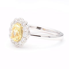 Natural Yellow Oval and White Diamond 1.06 Carat TW Platinum Cocktail Ring