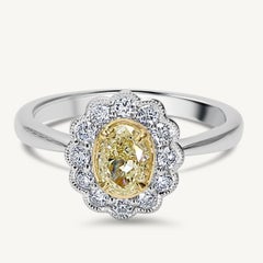 Natural Yellow Oval and White Diamond 1.06 Carat TW Platinum Cocktail Ring