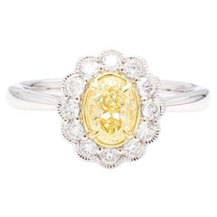 Bague cocktail en platine avec diamants ovales et blancs naturels de 1.06 carat poids total