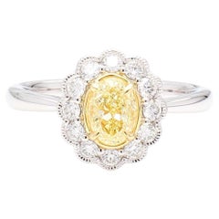 Natural Yellow Oval and White Diamond 1.06 Carat TW Platinum Cocktail Ring
