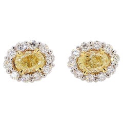 Natural Yellow Oval and White Diamond 2.09 Carat TW Gold Stud Earrings