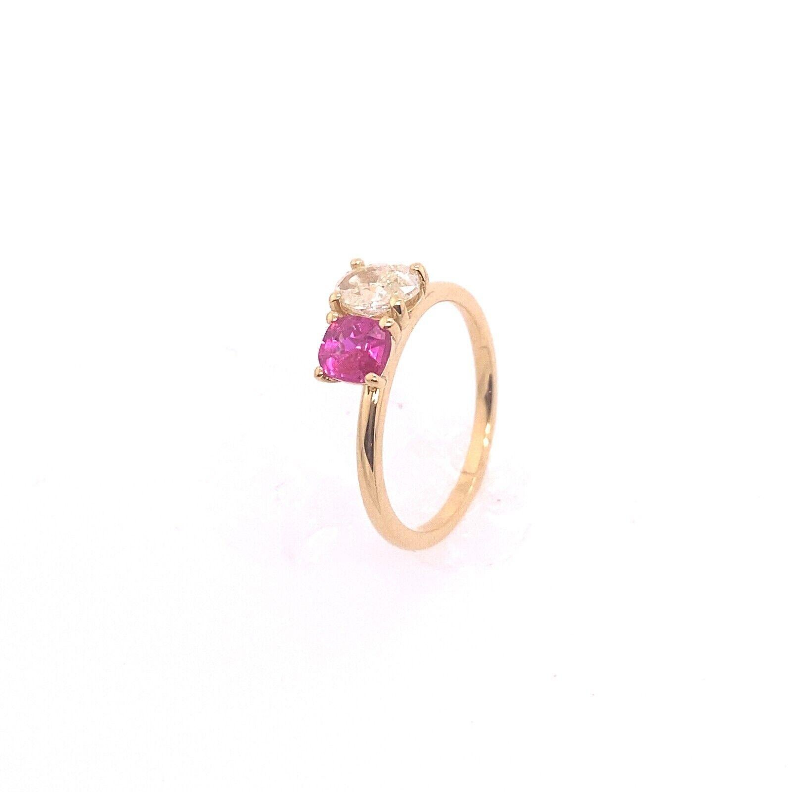 Natural Yellow Oval Diamond 0.62ct & Cushion Shape Ruby Ring, Set In 18ct Gold
A unique combination of natural Yellow Oval Diamond and cushion shape Ruby, this ring is a one of a kind design. The oval Diamond is 0.62ct and 0.51ct cushion shape Ruby