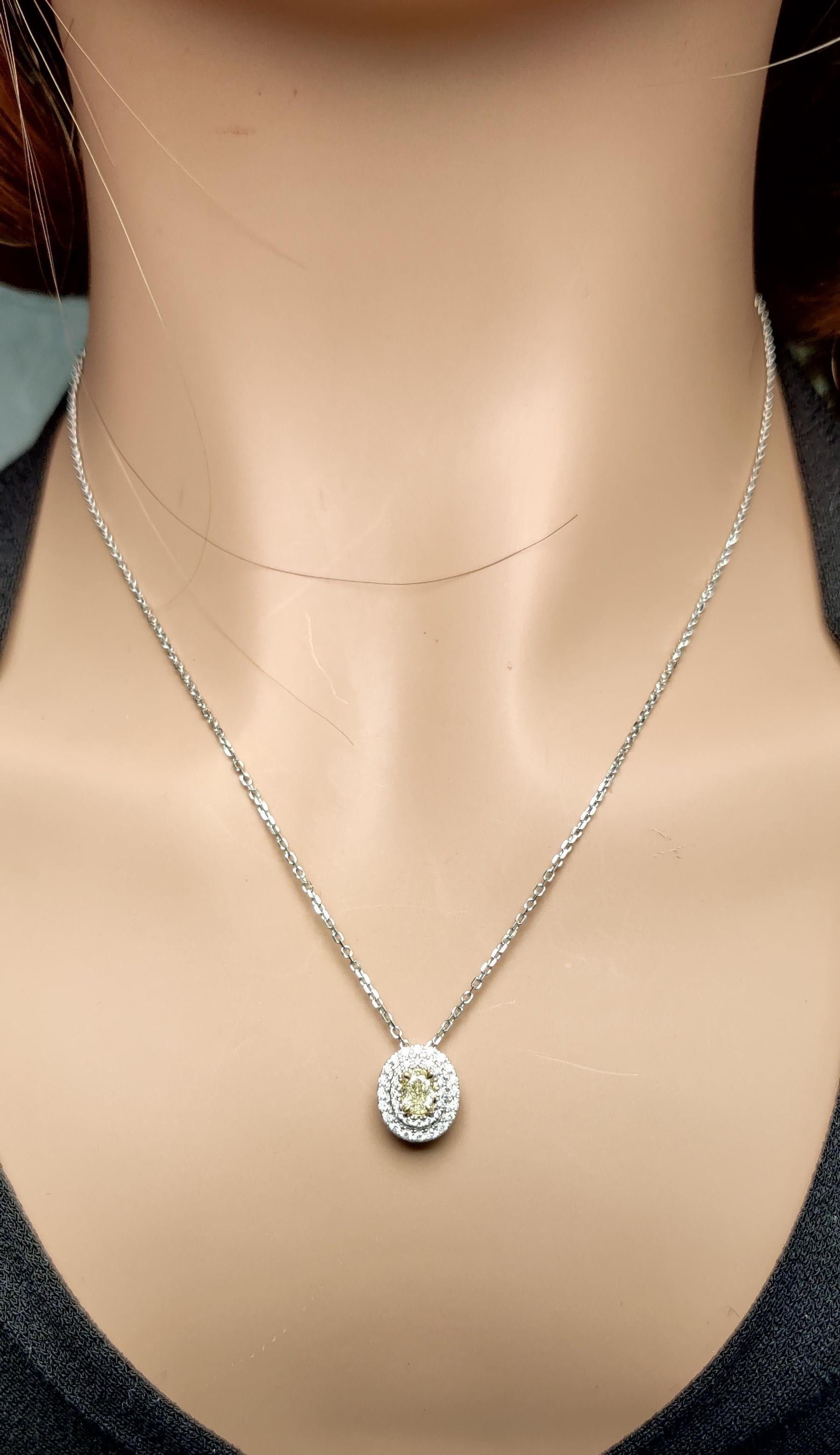 Natural Yellow Oval Diamond 0.66 Carat TW Gold Drop Pendant In New Condition For Sale In New York, NY