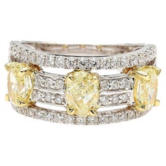 Natural Yellow Oval Diamond 2.13 Carat TW Gold 3-Stone Cocktail Ring