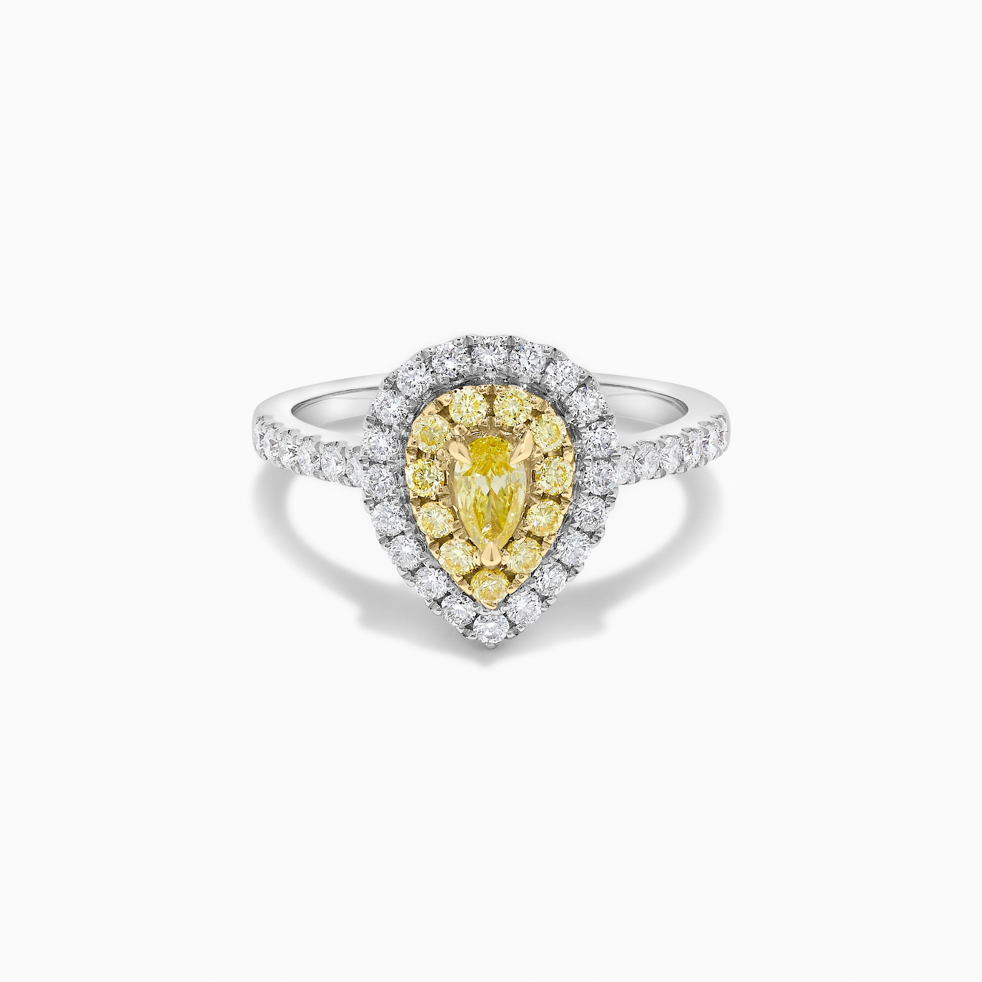 Contemporary Natural Yellow Pear and White Diamond .87 Carat TW Platinum Cocktail Ring For Sale