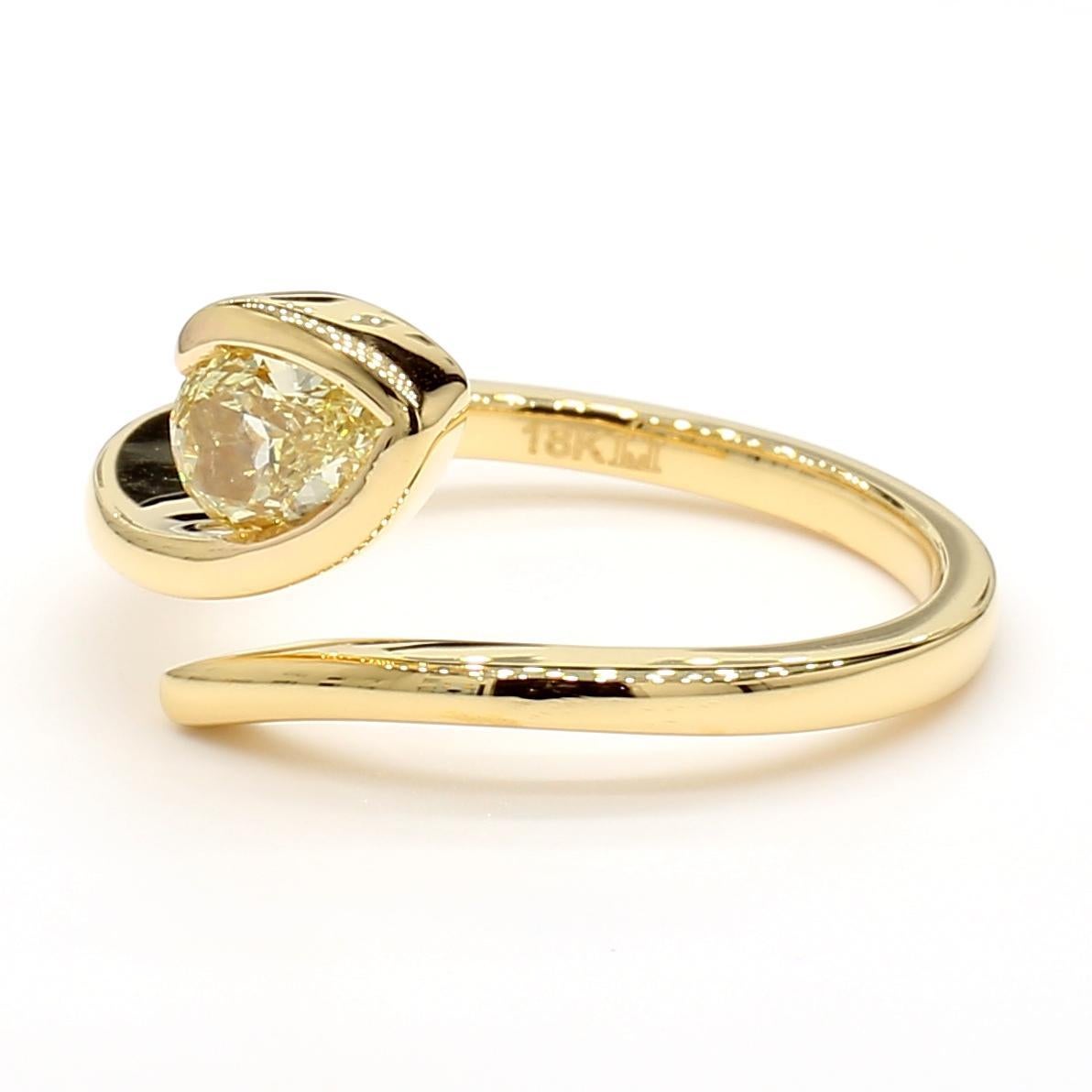 RareGemWorld's beautiful diamond ring. Mounted in a beautiful 18K Yellow Gold setting with a natural pear cut yellow diamond. This ring is guaranteed to impress and enhance your personal collection!

Total Weight: .50cts

Natural Pear Cut Yellow