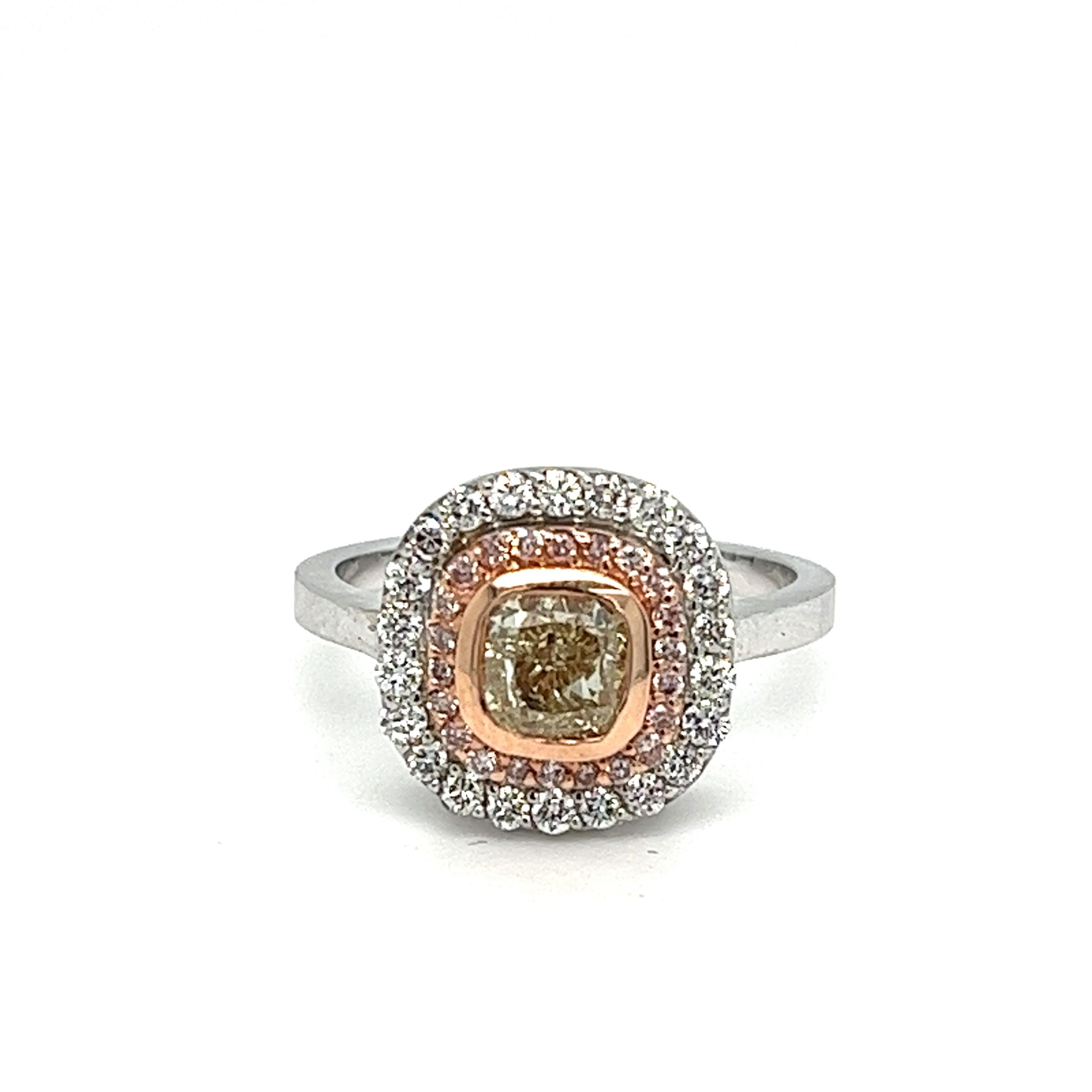 Offered here is a Stunning 1.66 Carats total weight Natural Earth Mined Yellow, Pink, and White Diamond Ring

Description:
This exquisite, one-of-a-kind ring showcases the breathtaking allure of natural earth mined diamonds. The centerpiece is a