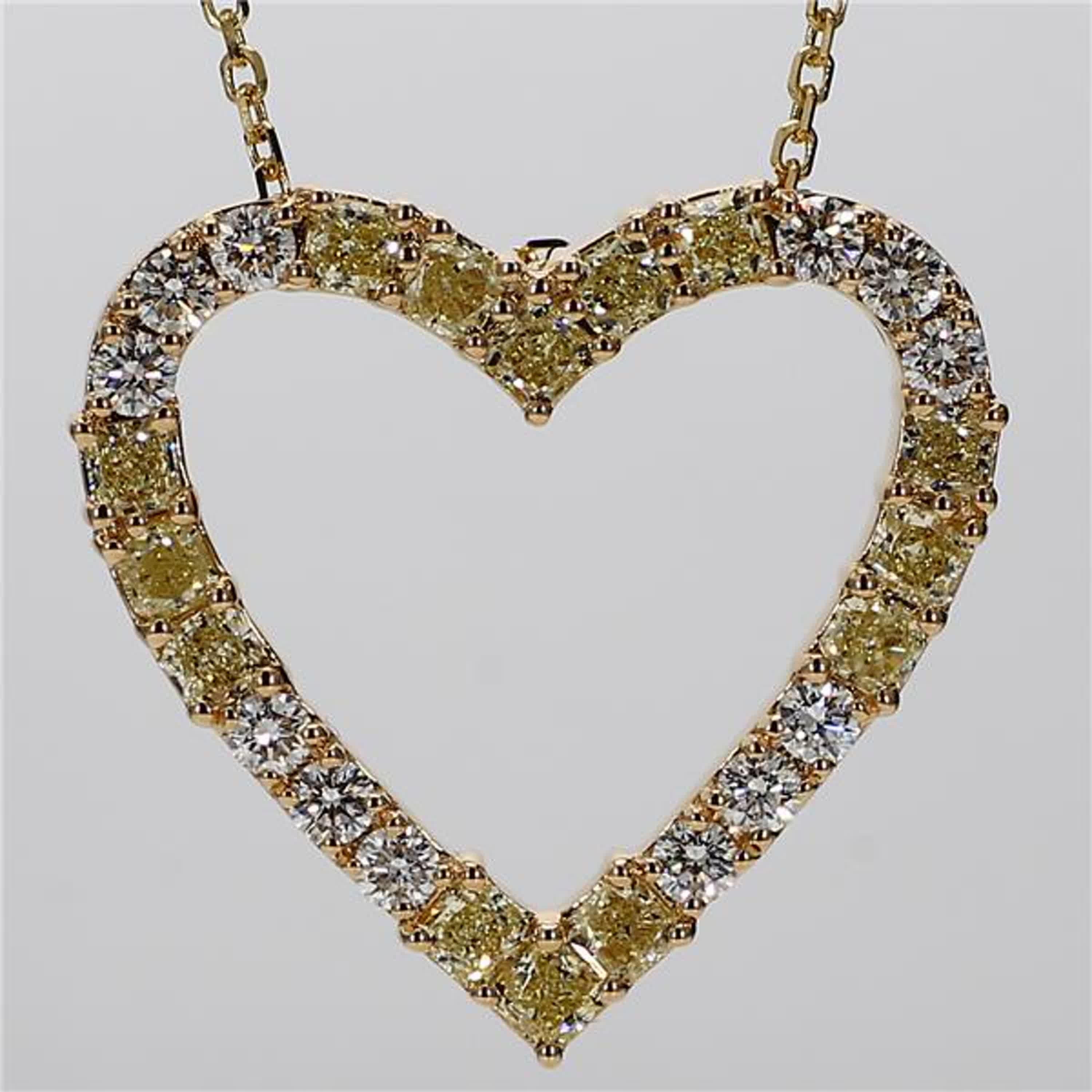 RareGemWorld's intriguing diamond necklace. Mounted in a beautiful 18K Yellow and White Gold setting with natural radiant cut yellow diamonds. The yellow diamonds are complimented by small round natural white diamond melee. This necklace is